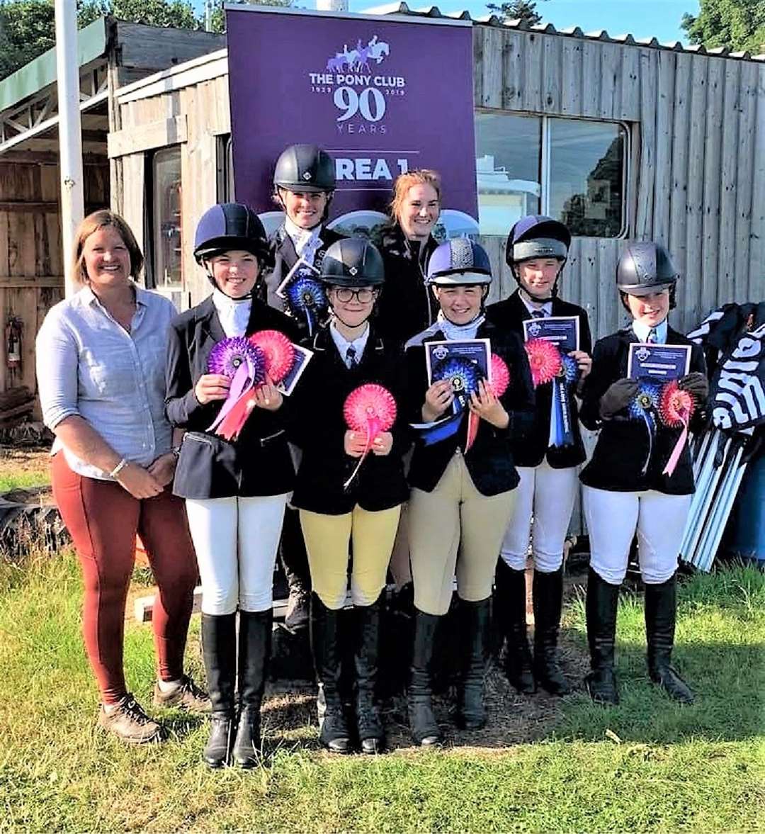 Proudly displaying their awards after the showjumping prize-giving are the Caithness team members along with branch DC Debbie Pottinger (front left). In the back row are Sophia Ramsøy and Frances Sutherland, while in the front (left to right) are Emily Campbell, Alysha Holmes, Lauren Oag, Erin Hewitson and Danielle Sinclair.