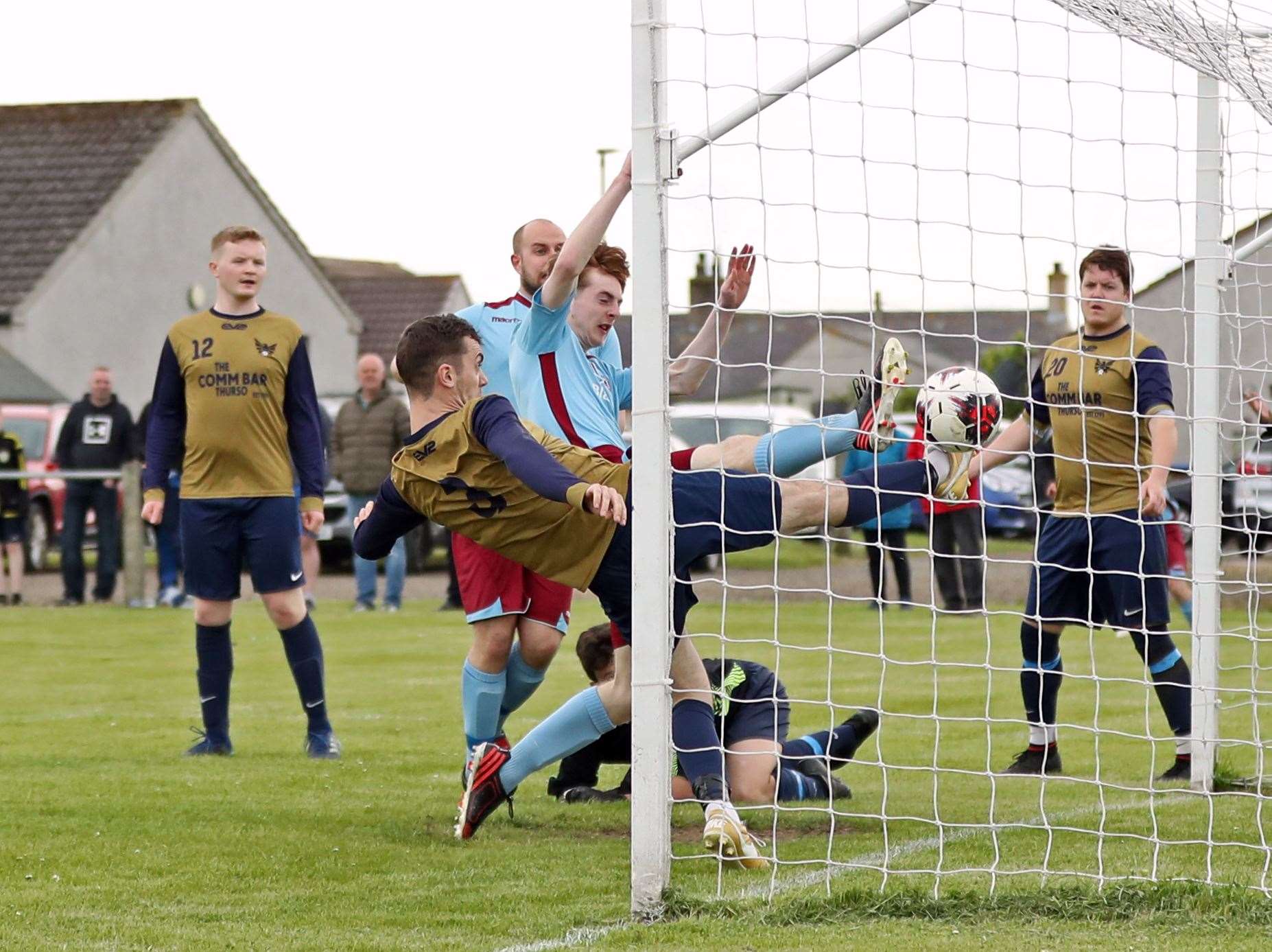 Pentland United's Roddy Innes forces the ball over the line to score equaliser, despite the efforts of High Ormlie Hotspur defender Ian Ross. Picture: James Gunn