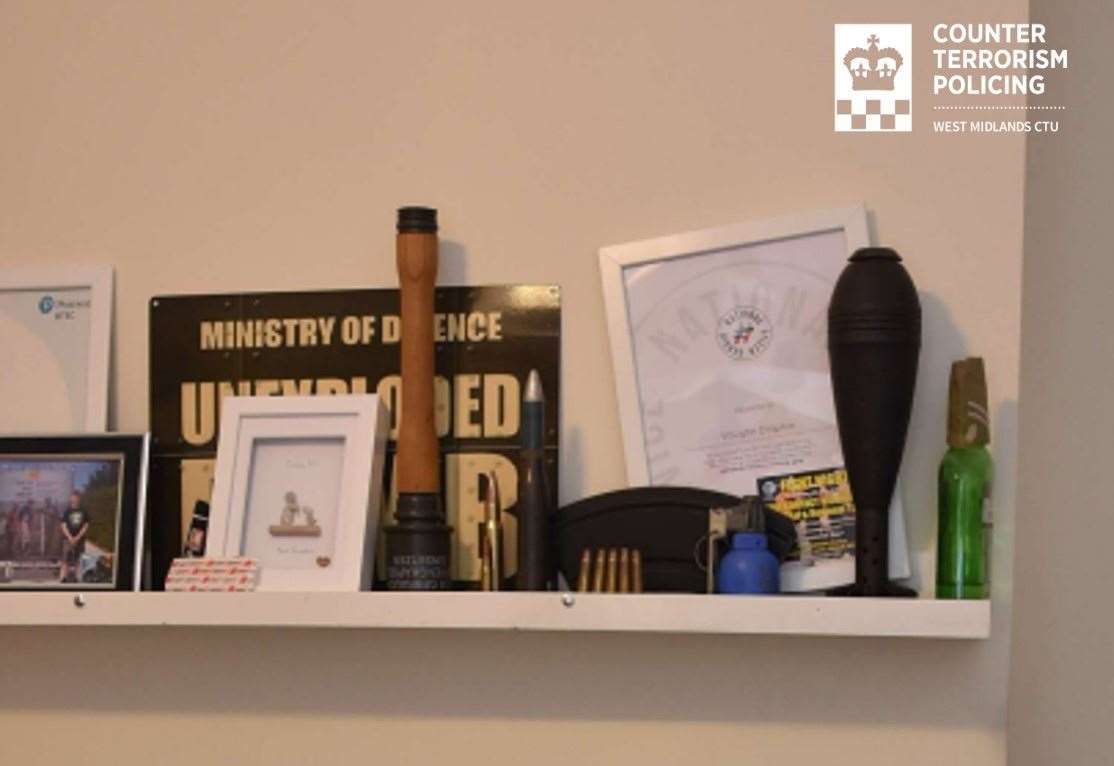 Vaughn Dolphin’s bedroom shelf, with the decommissioned grenade, mortar bomb and ammunition (West Midlands Police/PA)