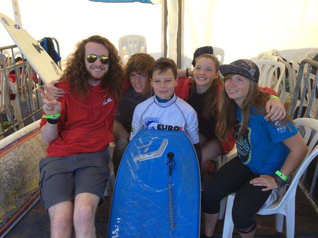 Iona (right) pictured with the Scottish junior surfing team in Morocco.