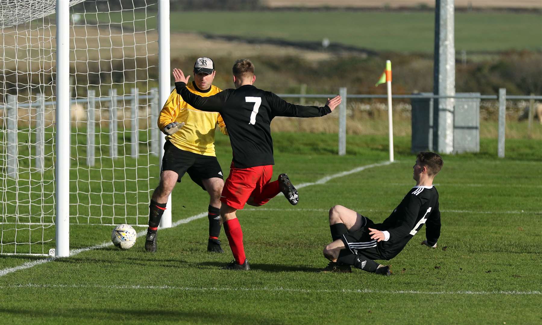 Korbyn Cameron beats Christie Cannop to score Halkirk United's second goal against Thurso. Picture: James Gunn