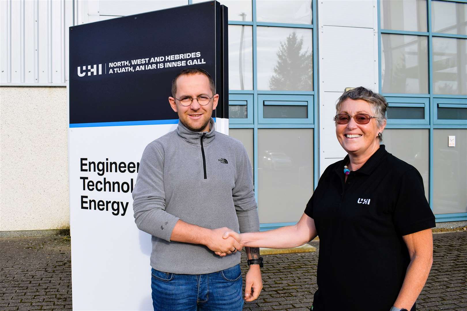 Michael Budge is congratulated by UHI Engineering lecturer Lois Gray. Picture supplied