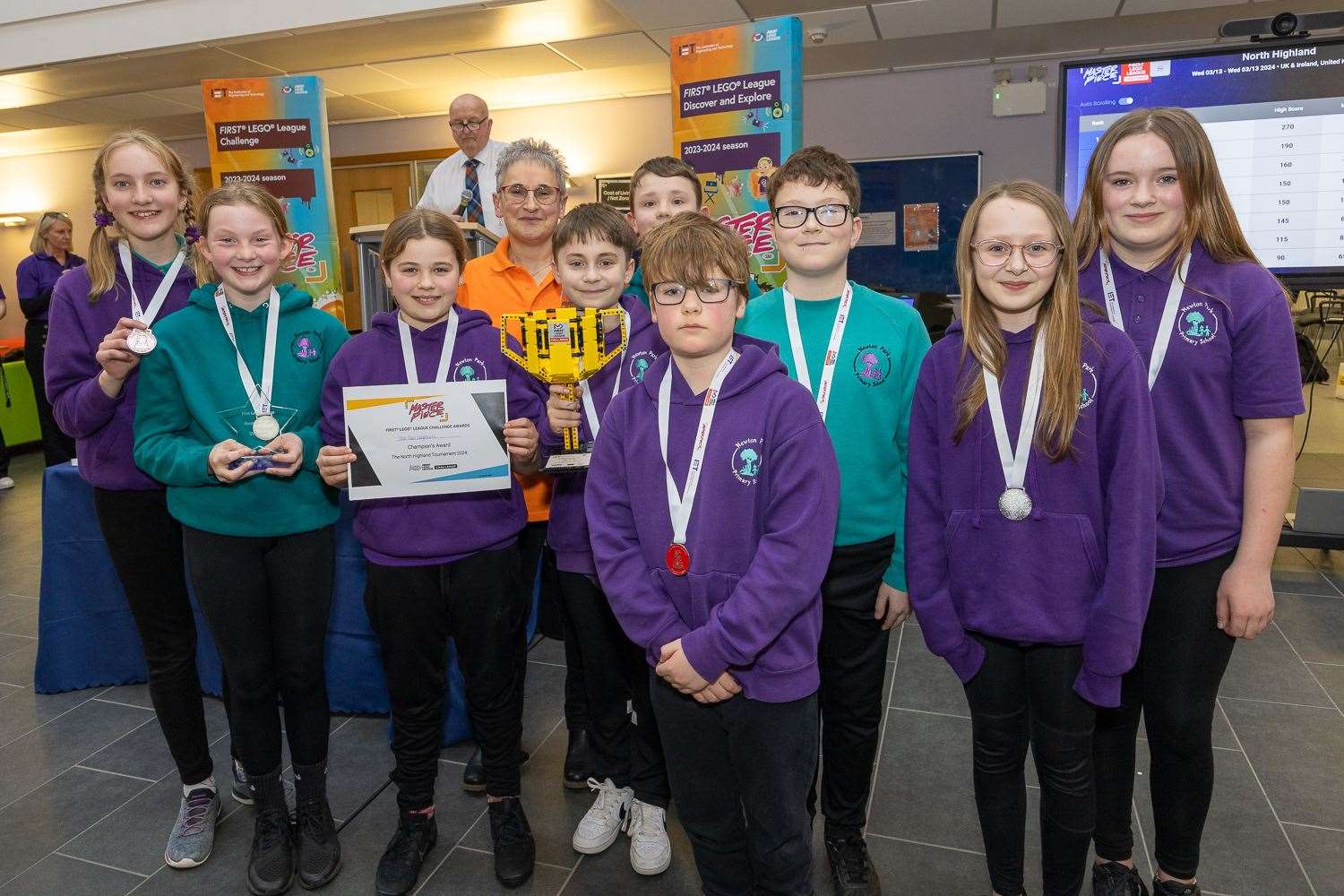 Members of the winning team, the Ten Lego-teers, with Trudy Morris, chief executive of Caithness Chamber of Commerce and DYW North Highland lead.