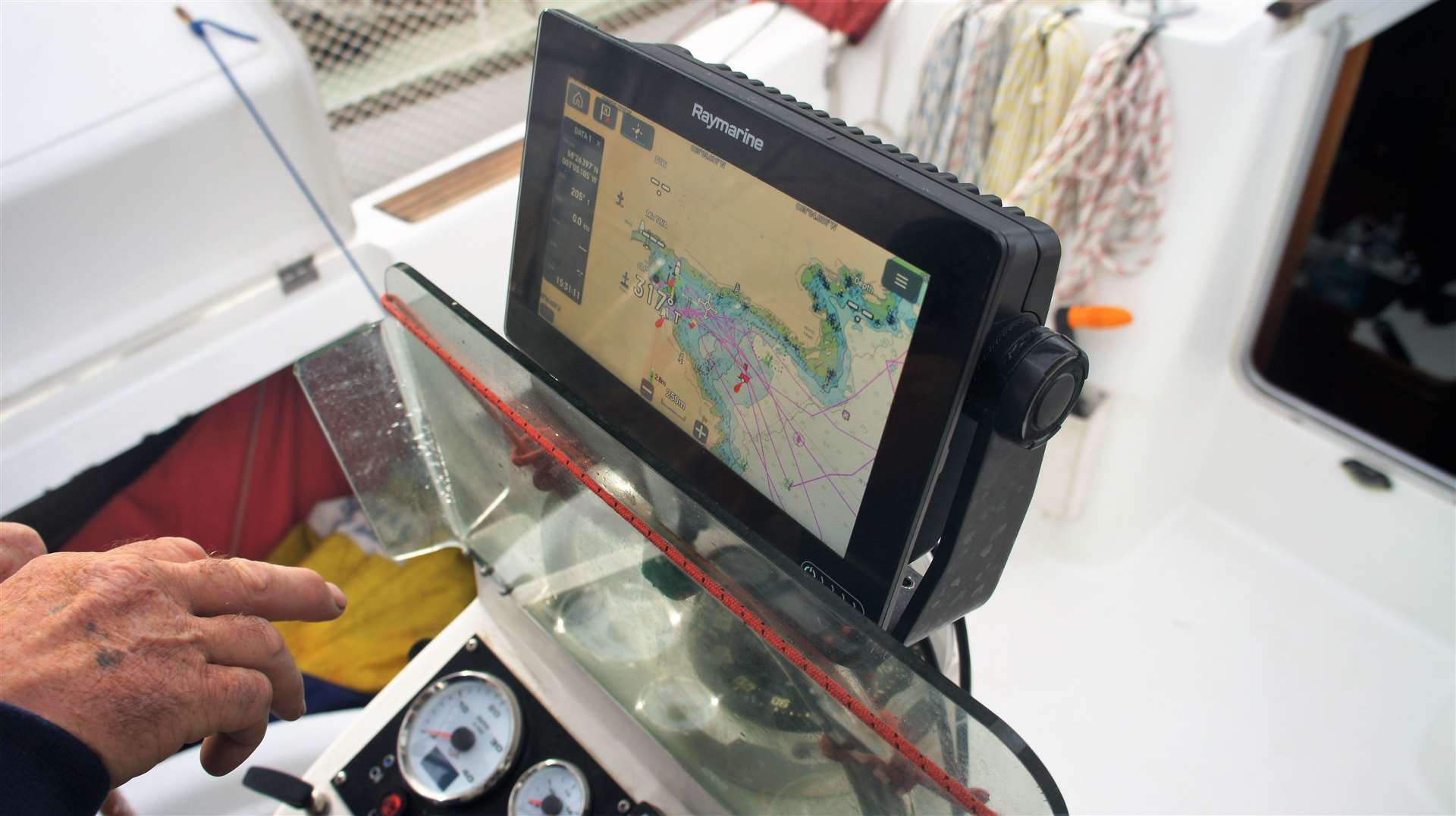 George Durrand shows the navigation equipment on his yacht and the planned route. Picture: DGS