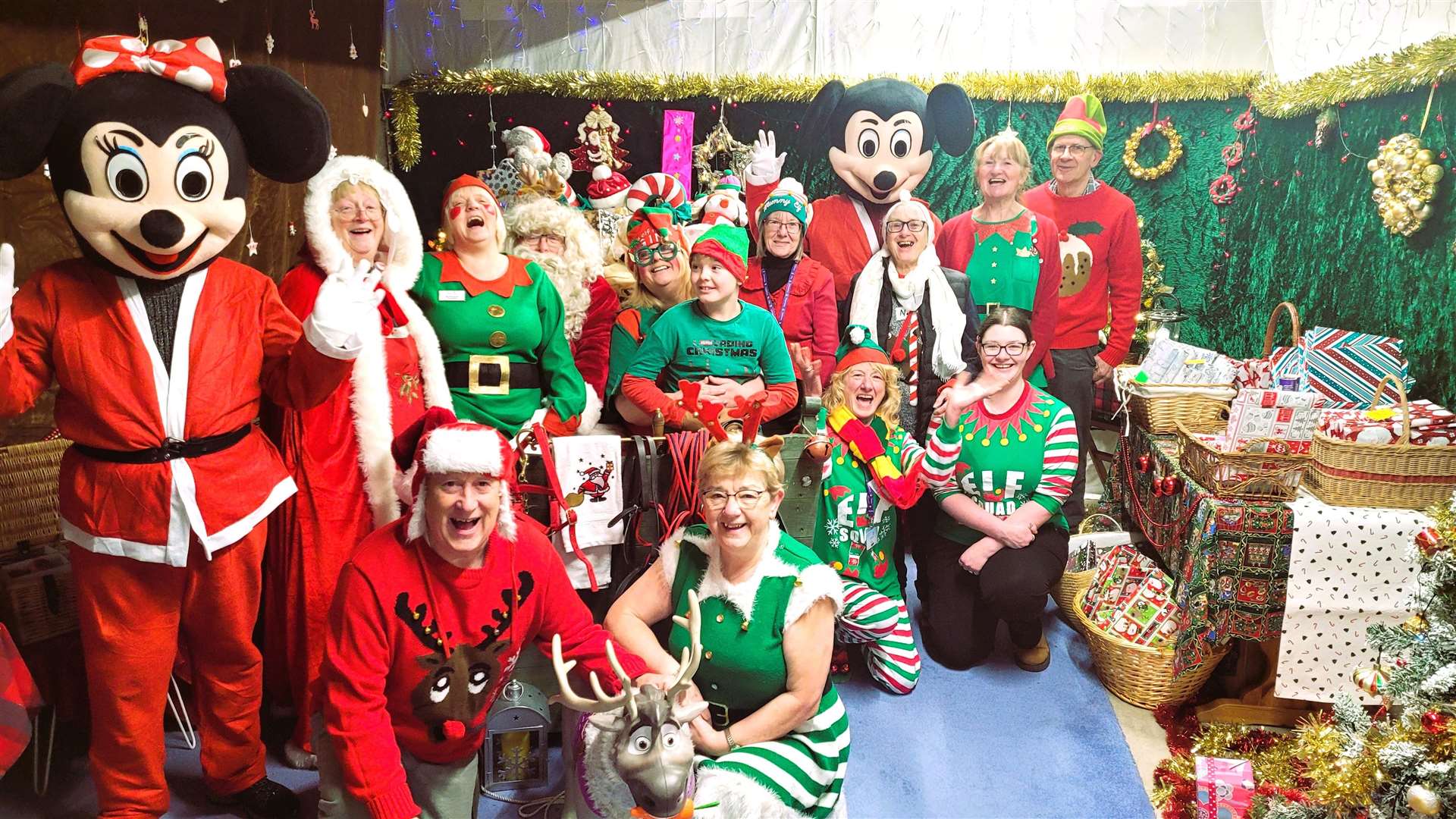 Santa and Mrs Claus together with their elves, Mr and Mrs Mouse and staff from the Highland Hospice charity shop in Thurso. Picture supplied