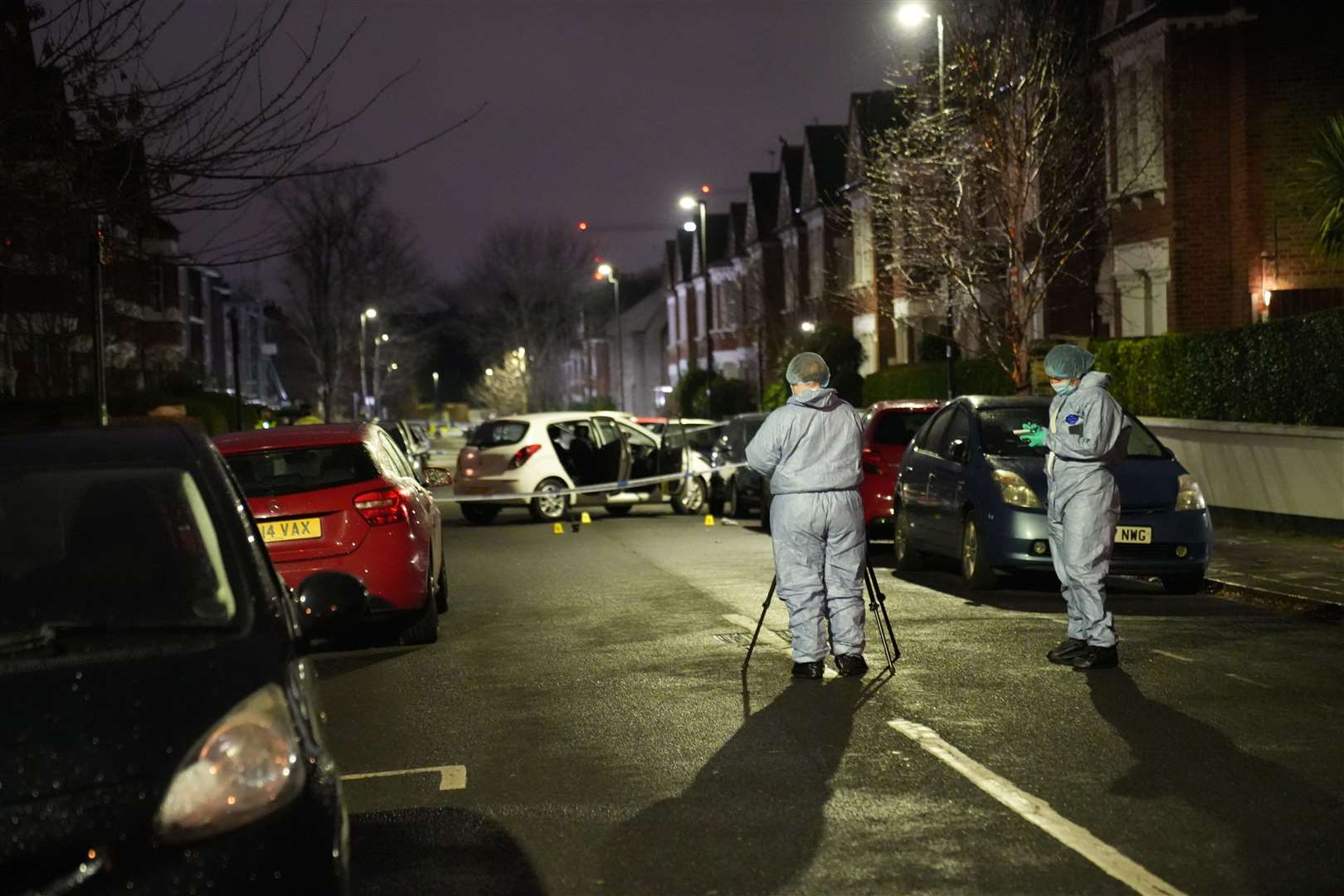 Police at the scene in Lessar Avenue near Clapham Common, south London. (Metropolitan Police/PA)