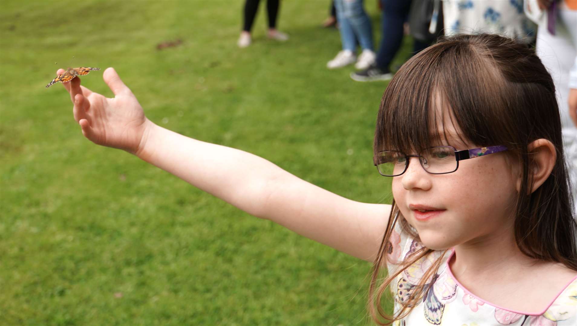 A little girl releases her Simba butterfly at last year's poignant event in Wick. Picture: DGS