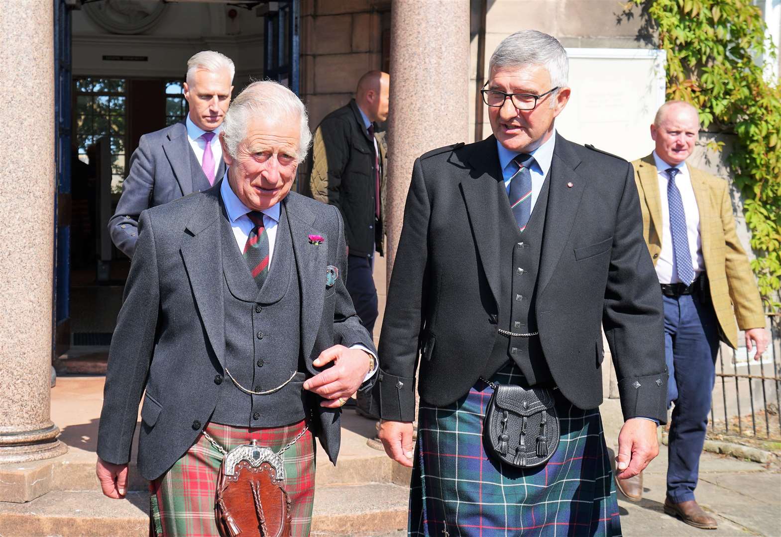 HRH Prince Charles leaves the Carnegie building accompanied by the Vice Lord Lieutenant of Caithness Willie Watt. Picture: DGS