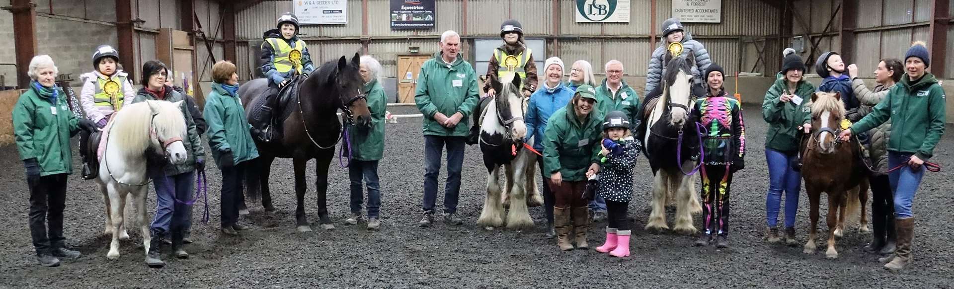 Youngsters from ride one with volunteers and Frank Stephen, who presented the trophies and rosettes. Picture: Neil Buchan