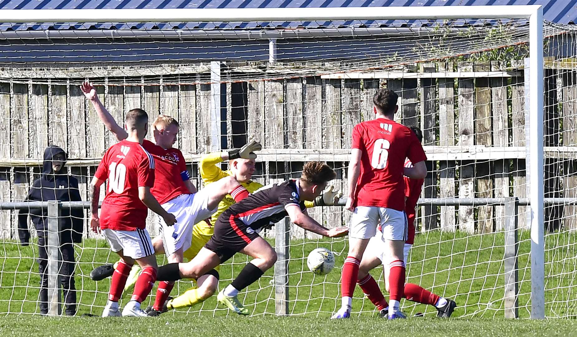 Mark Macadie's header makes it 3-1 to Wick Academy just before half-time at Princess Royal Park. Picture: Mel Roger