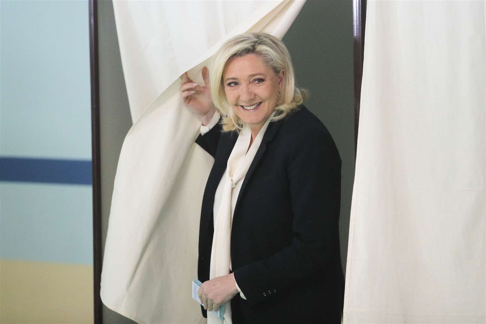 French far-right contender Marine Le Pen casts her vote in Henin-Beaumont, France (AP Photo/Michel Spingler)