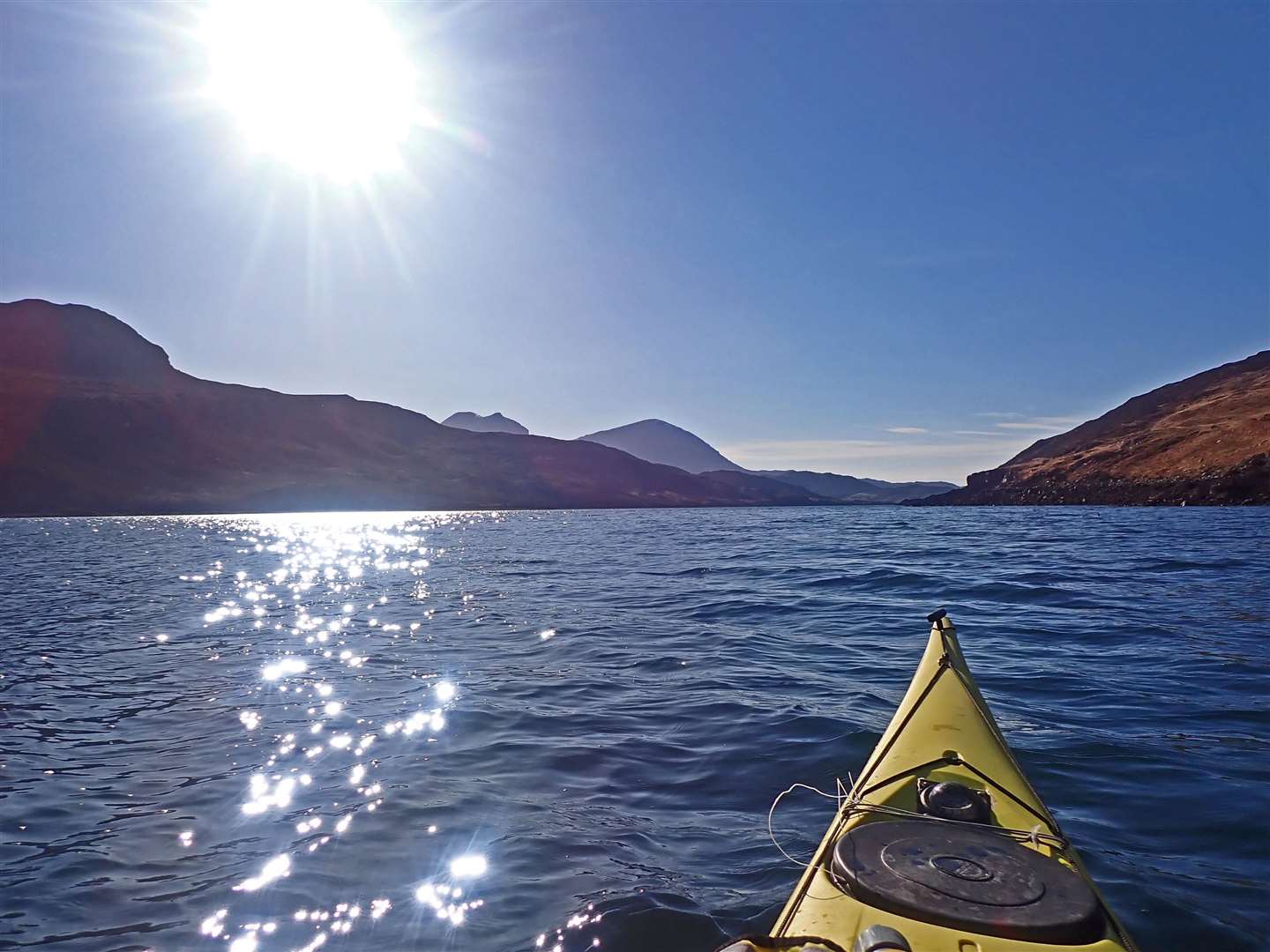 Paddling back to Kylesku in the afternoon sun.