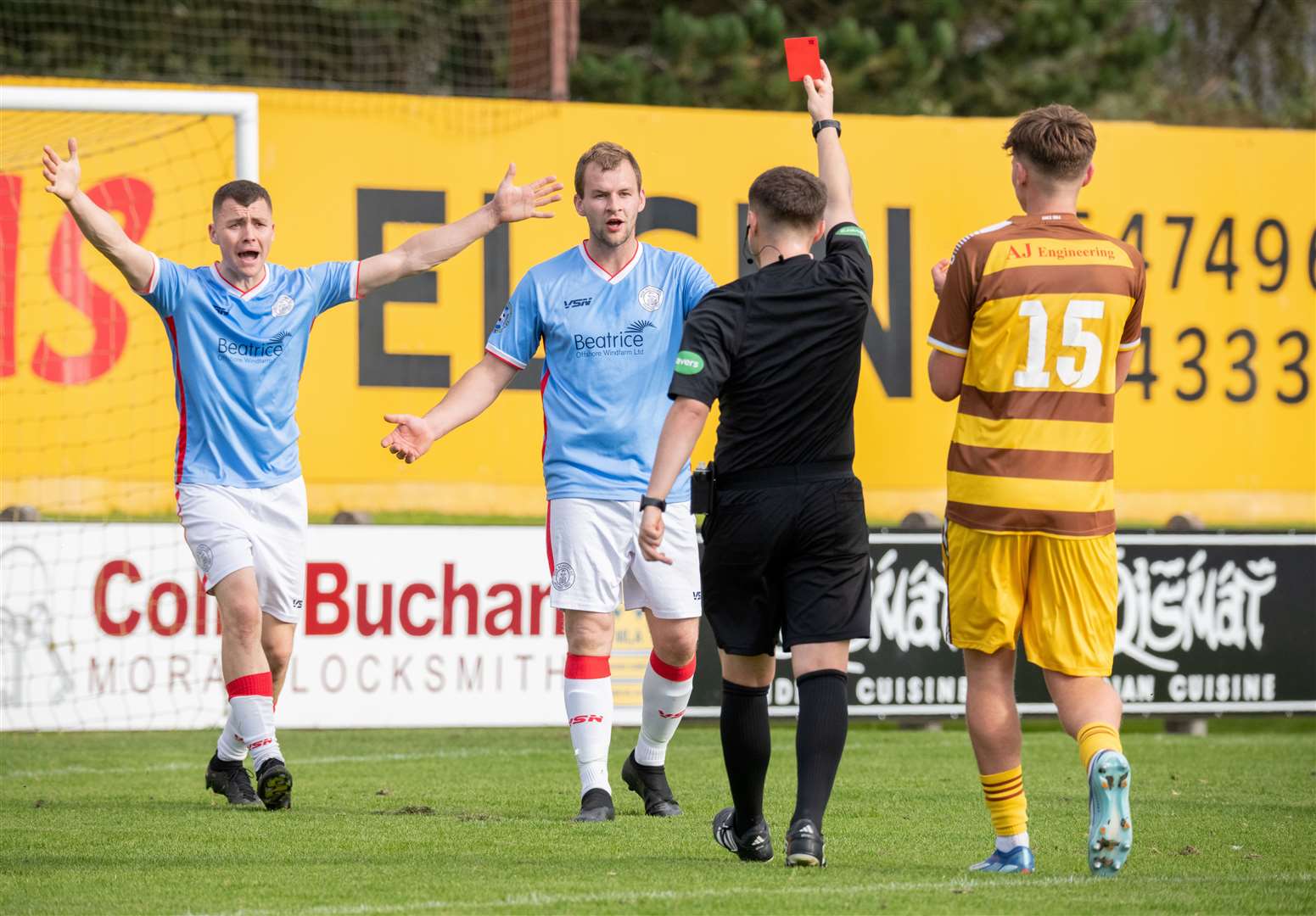 Wick Academy's Owen Rendall is sent off by referee Alex Ross. Picture: Daniel Forsyth