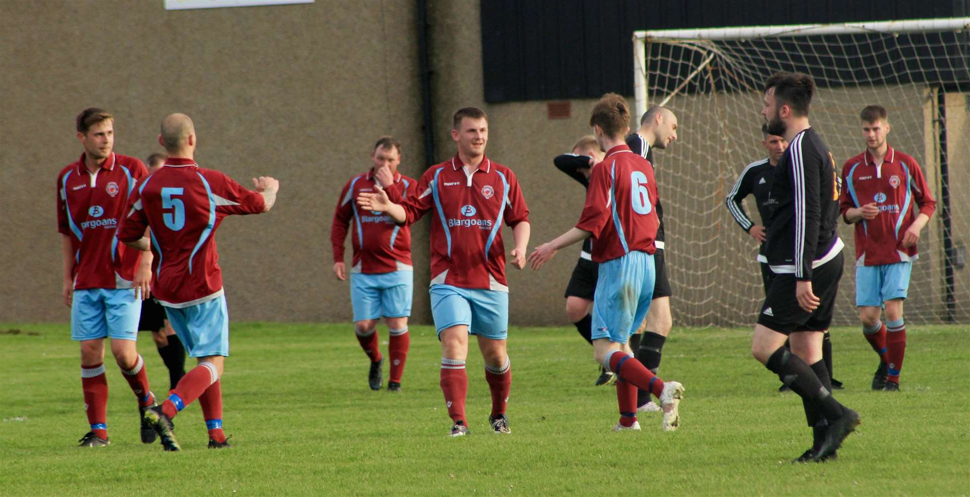 Andy Mackay takes the acclaim of team-mates after opening the scoring for Pentland United against Staxigoe at the Upper Bignold.