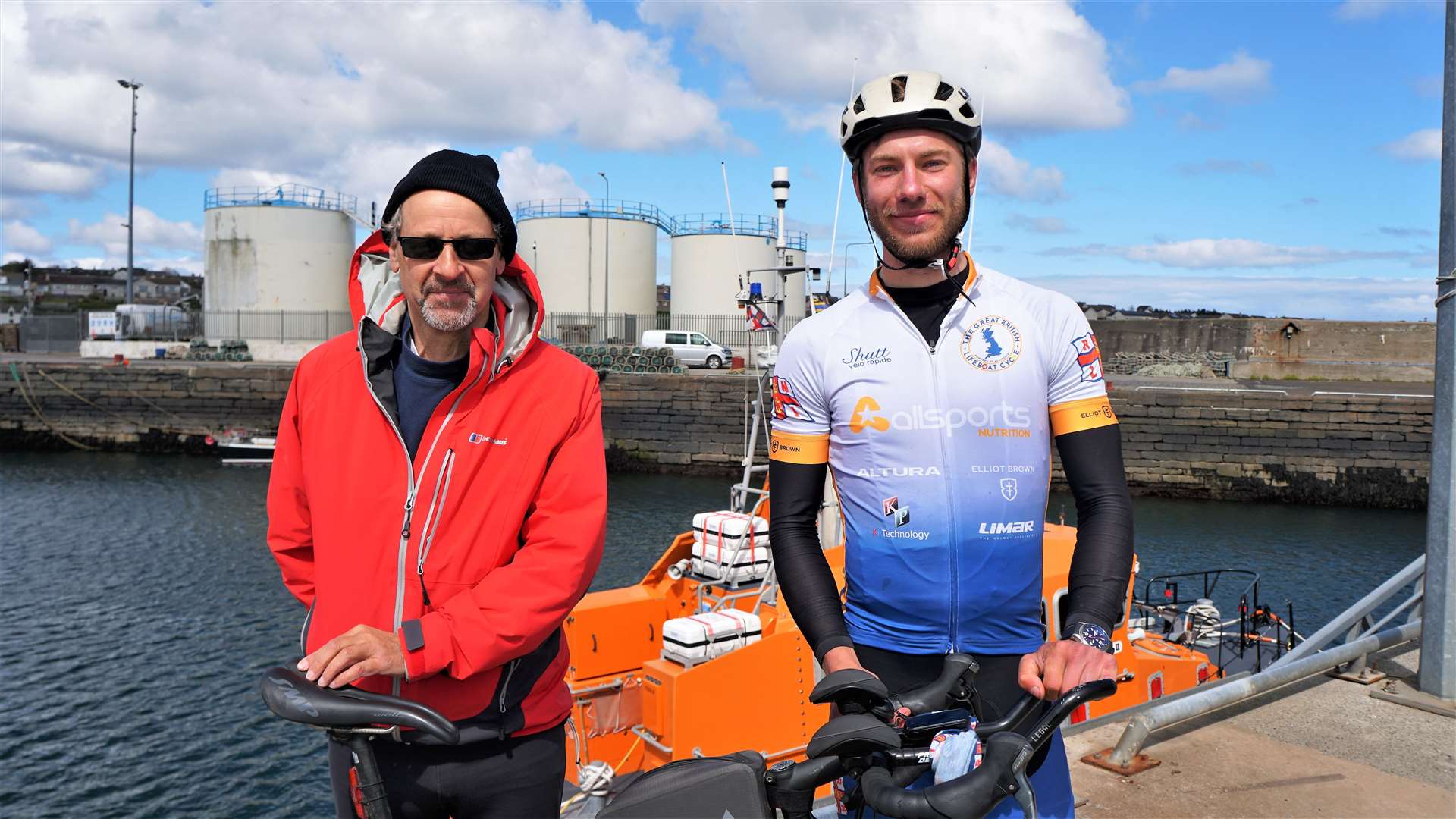 Professor Iain Baikie, left, with Harry Lidgley at Wick harbour on Saturday morning. The Wick scientist's company logo – KP Technology – is on Harry's shirt as one of the main sponsors. Picture: DGS