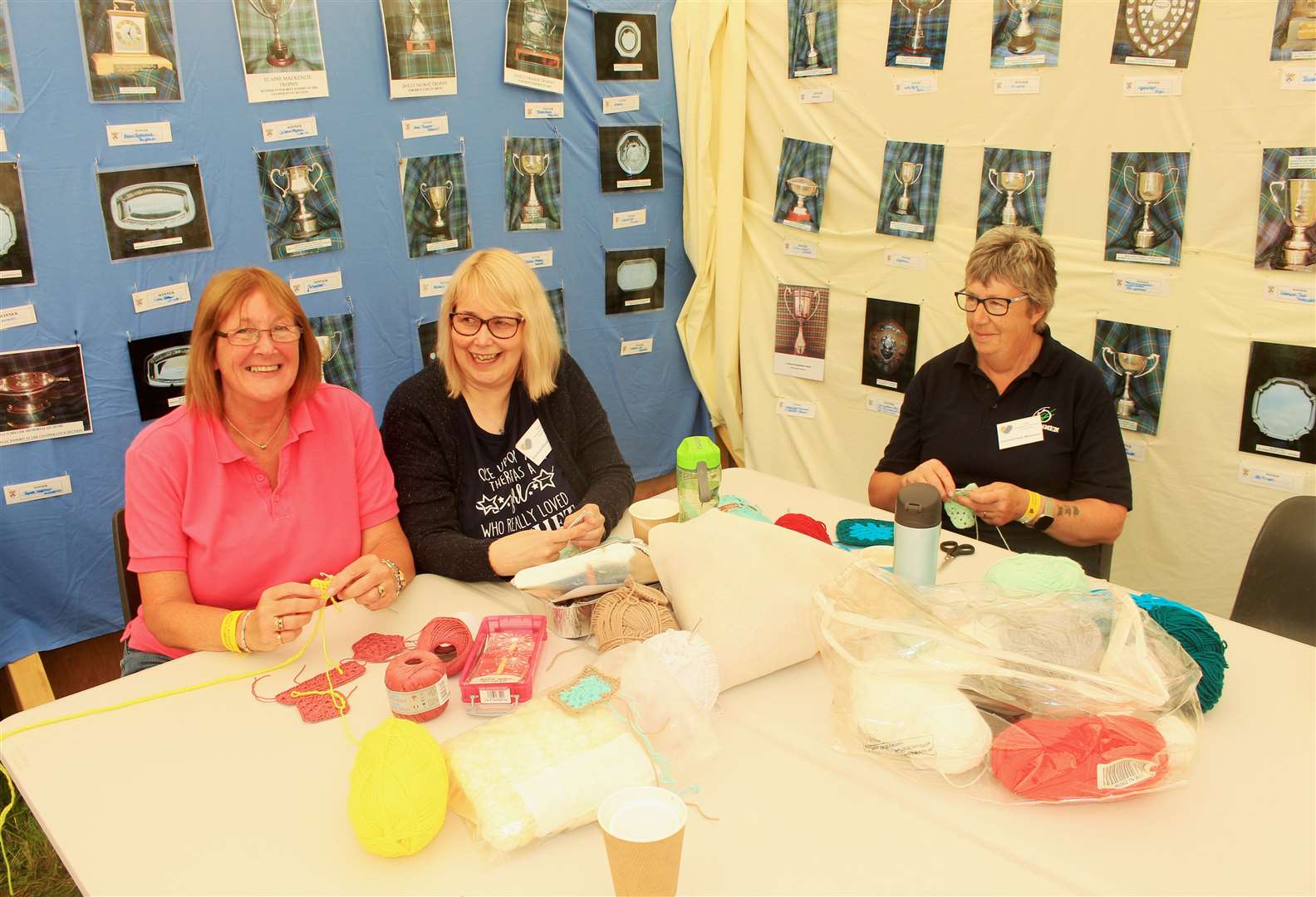 From left: Shona Sinclair, Lorraine Tait and Kim O'Brien at the crochet demonstration in the SWI tent. Picture: Alan Hendry