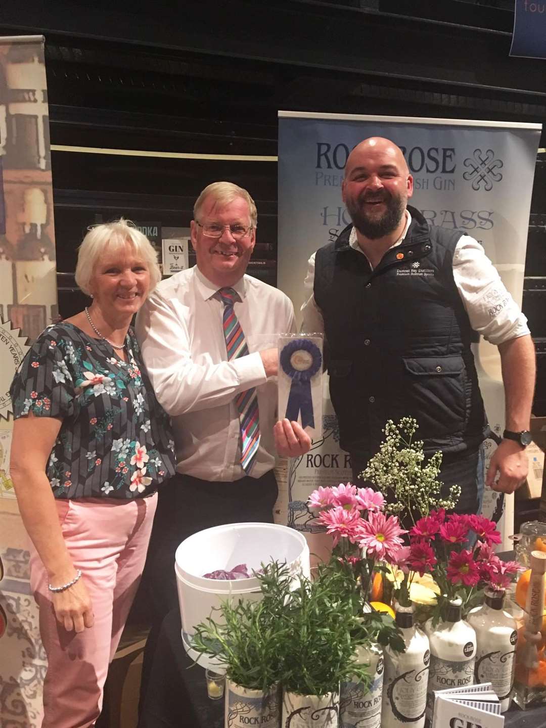 Sharon Davidson and David Dowling from the Cairngorm Group with Neil Stewart of Dunnet Bay Distillers at the Highland Food Drink Festival.