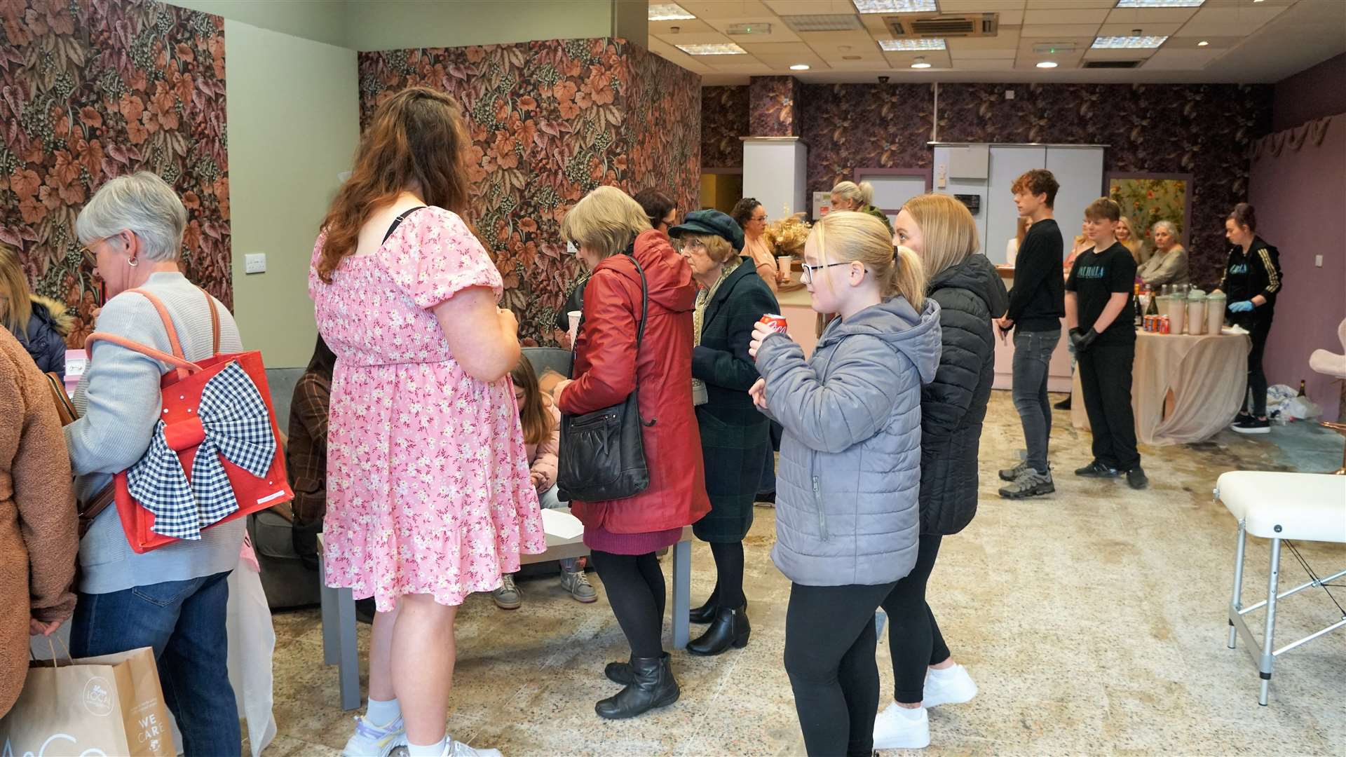 Visitors mingle with staff at the open day event for Northern Lights Aesthetics on Wick's High Street. Picture: DGS