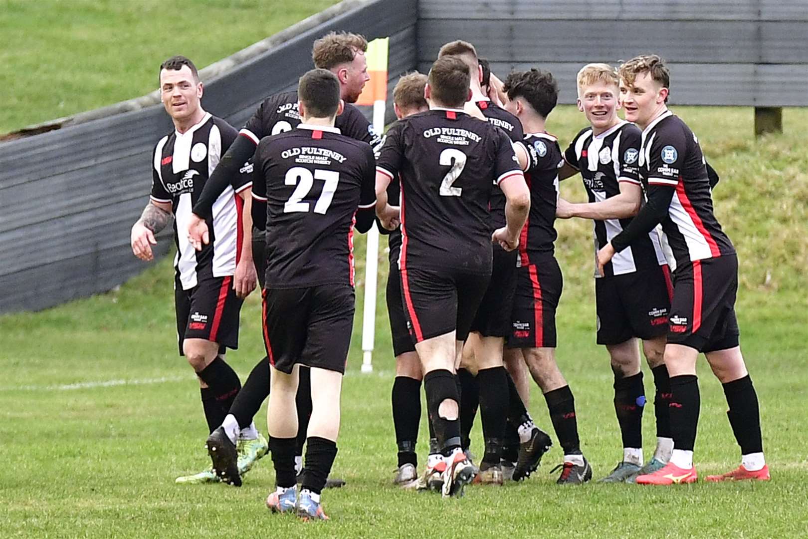Wick Academy players celebrate Kyle Henderson's goal which wrapped up the points against Lossiemouth last weekend. Picture: Mel Roger