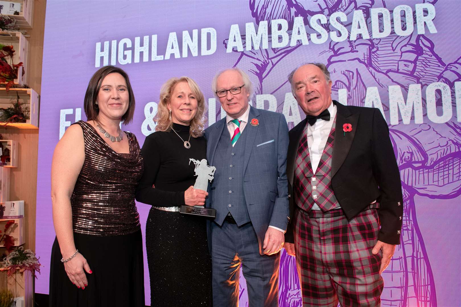 Ellie and Murray Lamont receiving the ambassador trophy from Anna Miller, of award sponsor Highlands and Islands Enterprise, with HITA chairman Laurence Young looking on. Picture: Callum Mackay