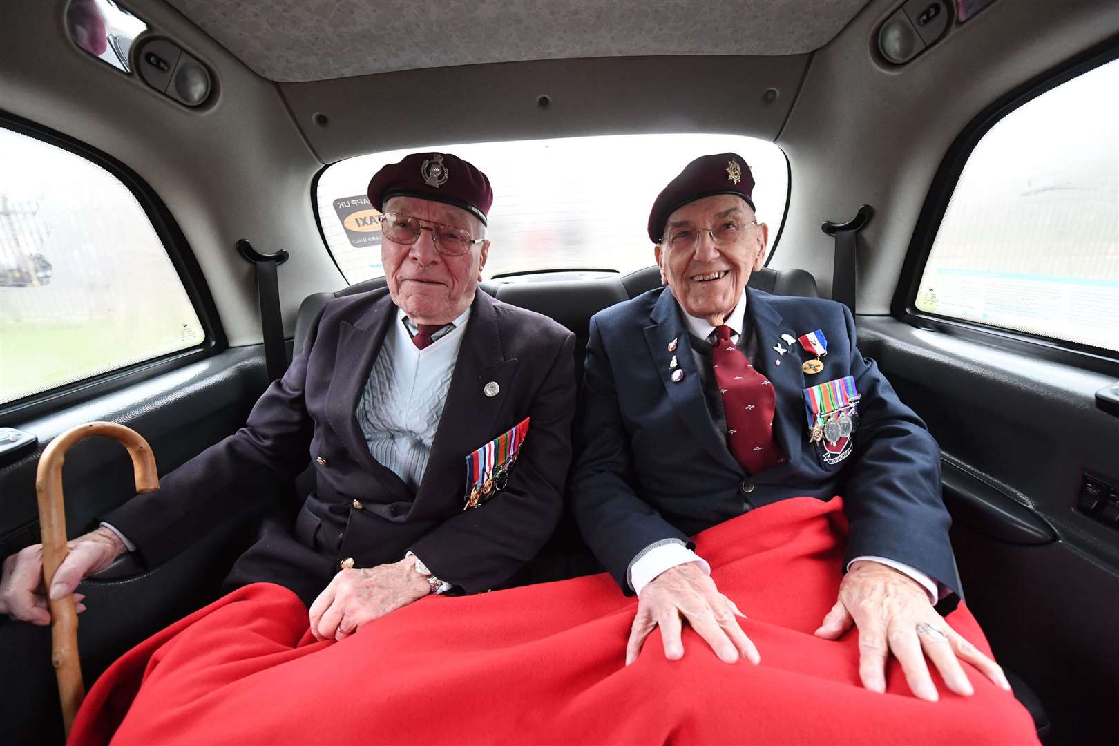 Bill Gladden (left) and Ted Pieri sit in the back of a black cab at Wellington Barracks, London, ahead of their veterans trip to northern France with the Taxi Charity (Victoria Jones/ PA)