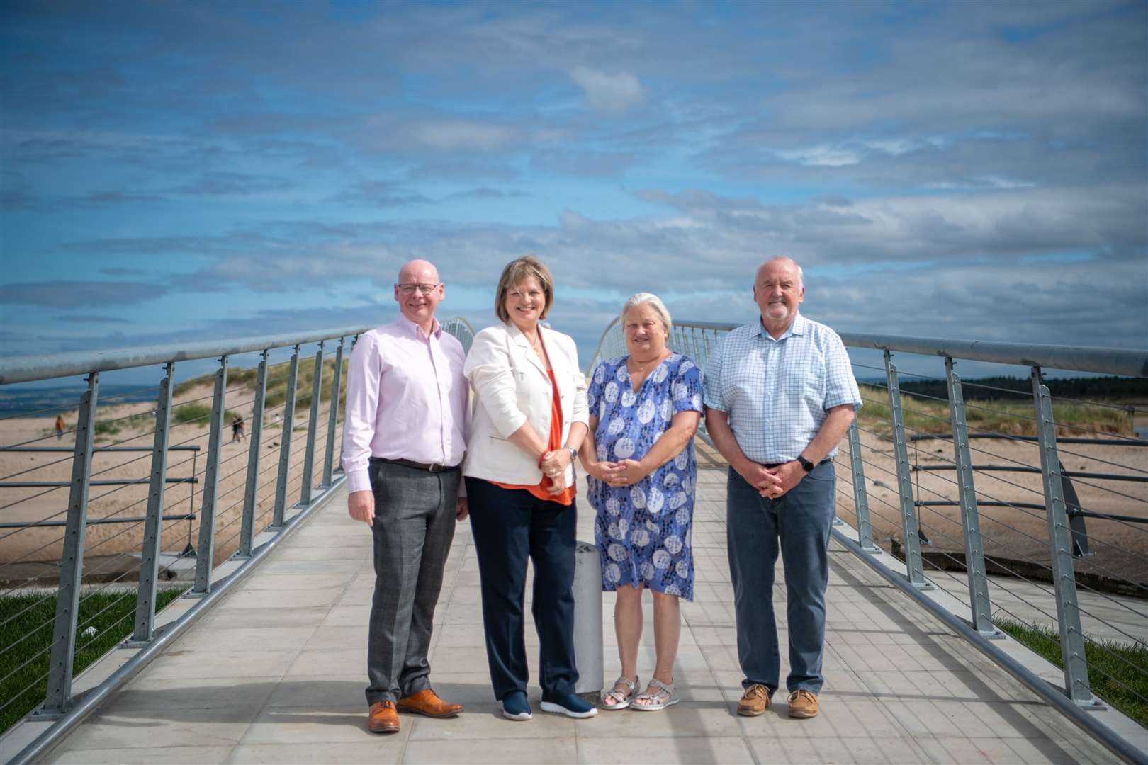 A replacement bridge at Lossiemouth's East Beach was one of the projects supported by the Beatrice Community Fund. From left: David Shearer, Fiona Morrison (SSE Renewables community investment managers), Fiona Birse and Rab Forbes (Lossiemouth Community Development Trust). Picture: SSE