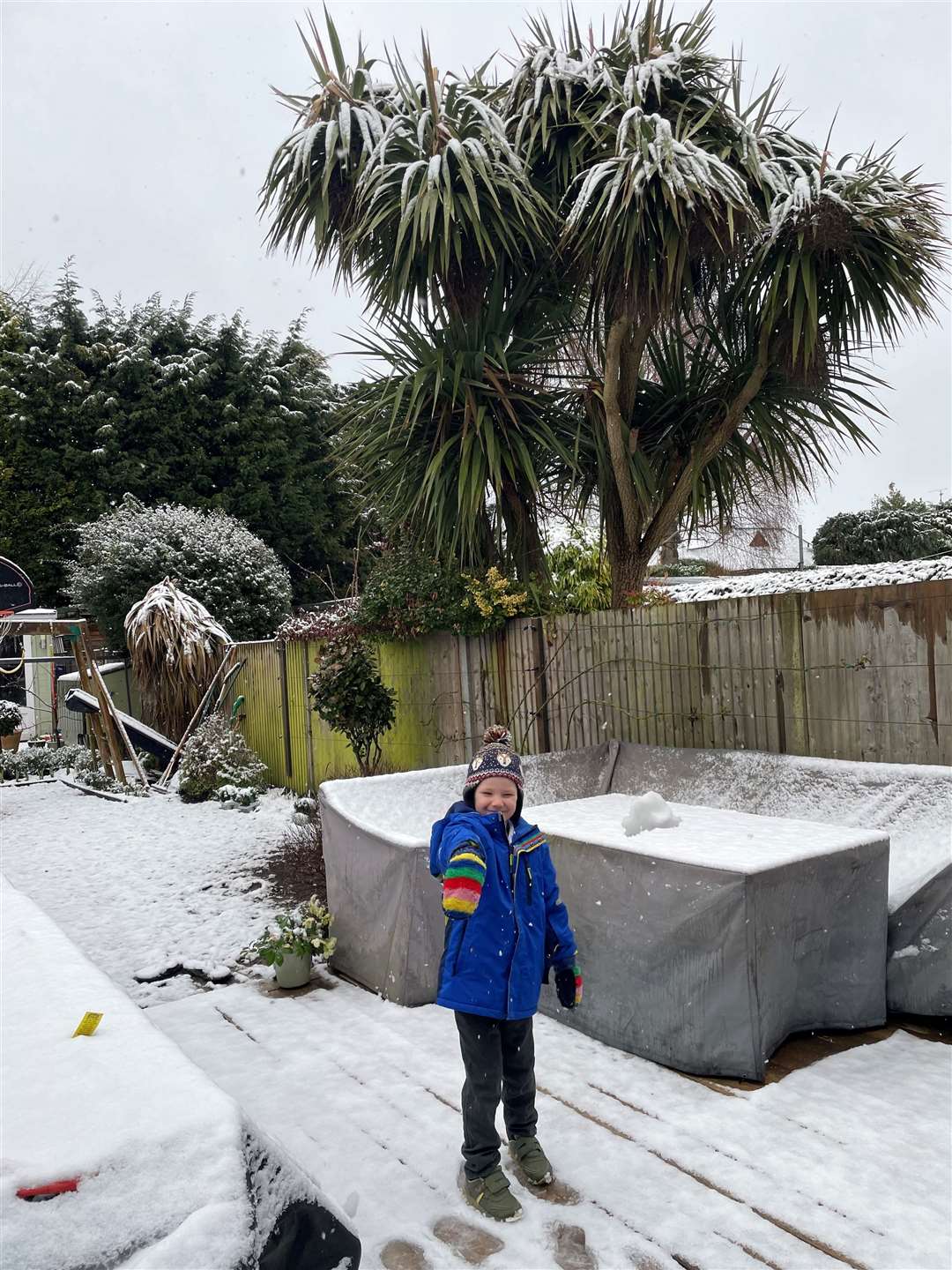 Five-year-old Harry Booth has fun in the snow in a garden in Horsham, West Sussex (Jane Kirby/PA)