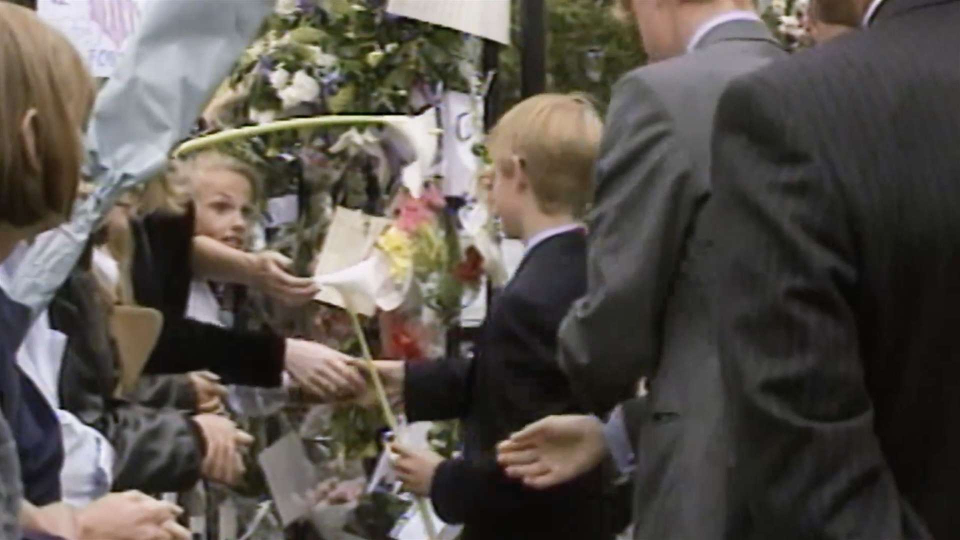 Harry says that he and William were unable to show any emotion as they met the mourners (ITV)