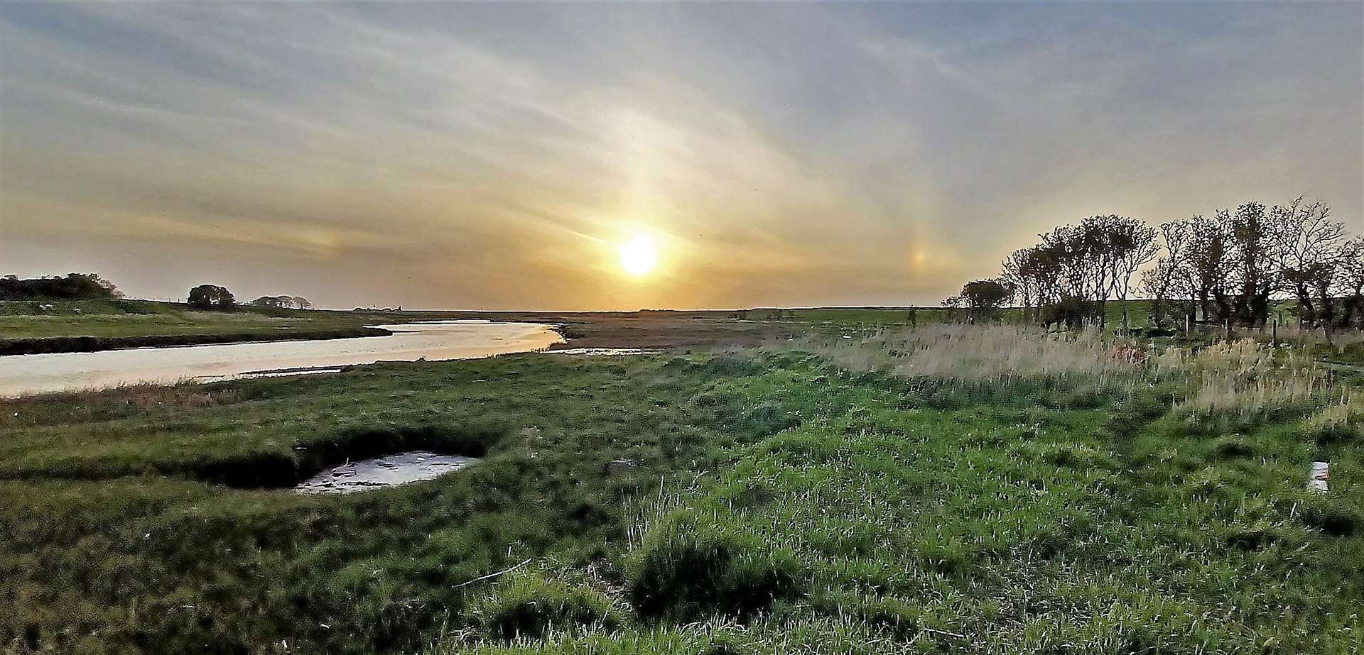 There were two parhelia either side of the setting sun at Wick riverside with the right hand one being stronger than the other. Picture: DGS