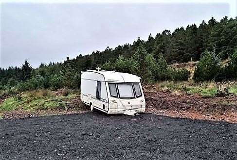 This caravan was found dumped in the car park that had been specially built for people visiting Ousdale broch.