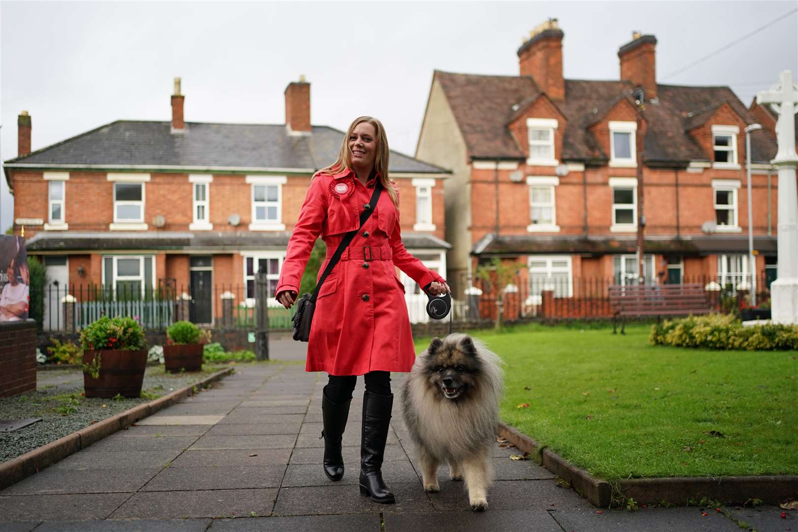 Labour candidate Sarah Edwards arrives with her dog Poykee to cast her vote (Jacob King/PA)