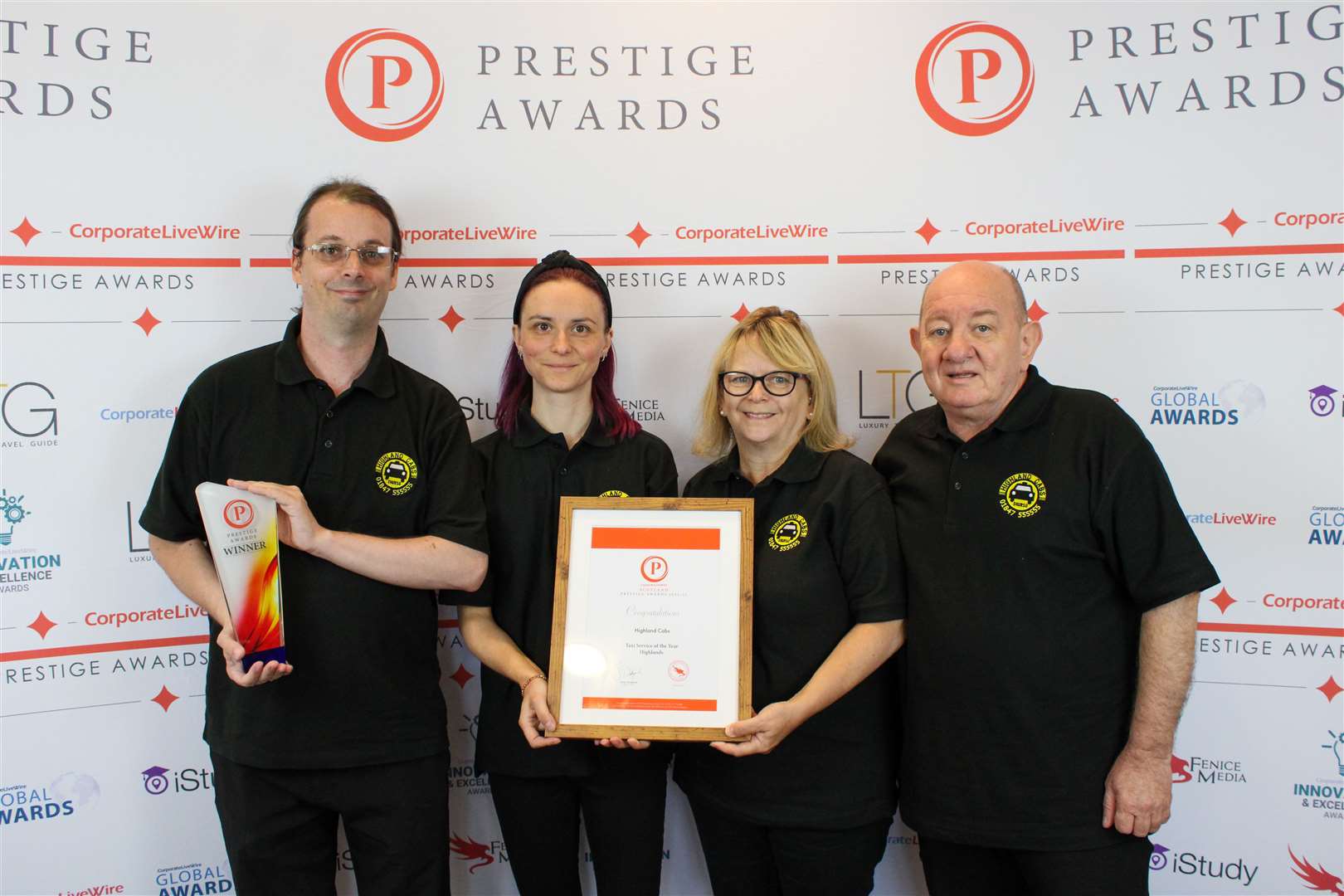 The team from Highland Cabs, Thurso, picking up their award. From left Paul Reid, Monica Stankevičiūtė, June West and Robert Connelly.