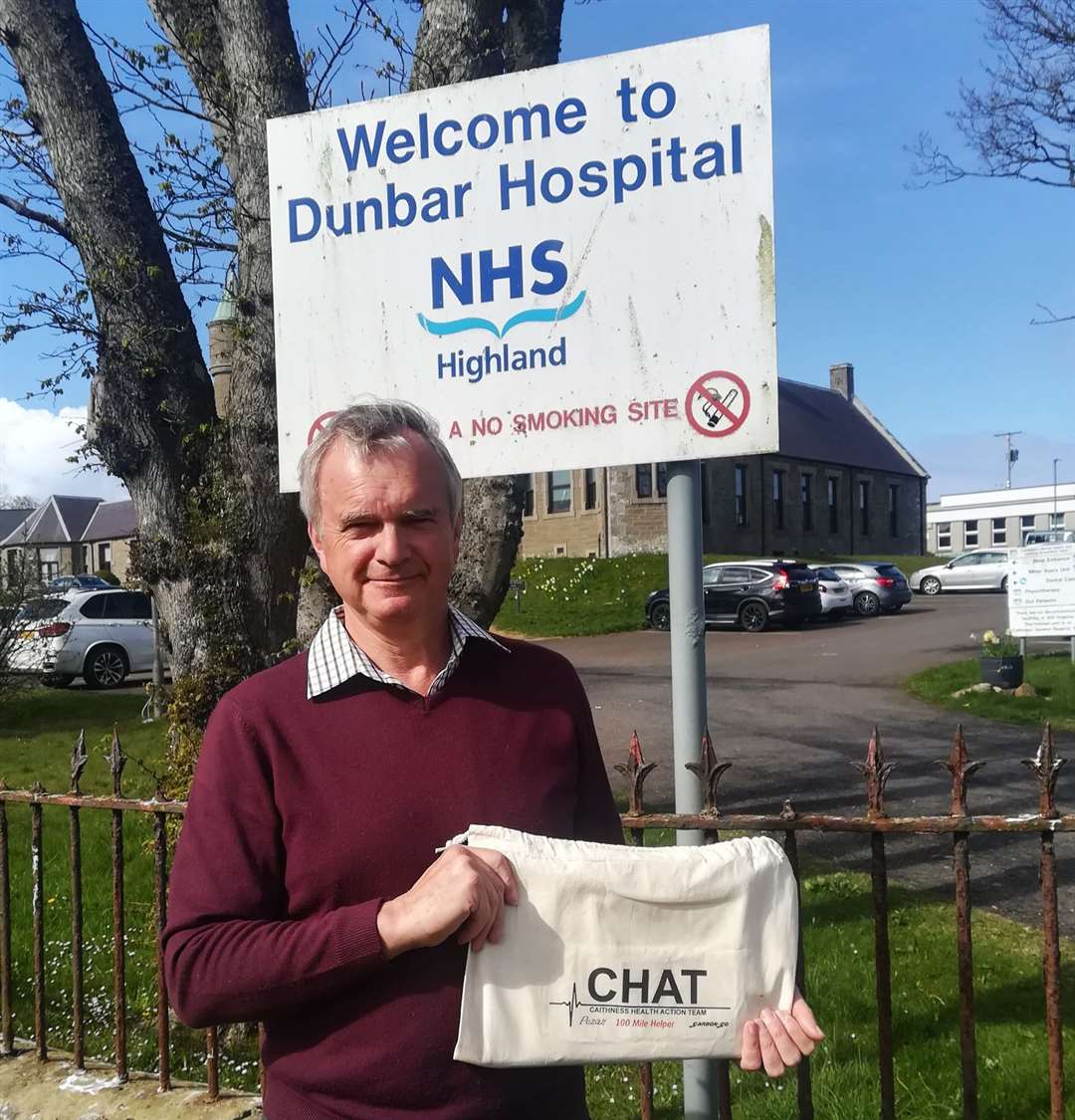 Ron Gunn of Caithness Health Action Team about to deliver tablets to the Dunbar Hospital in Thurso.