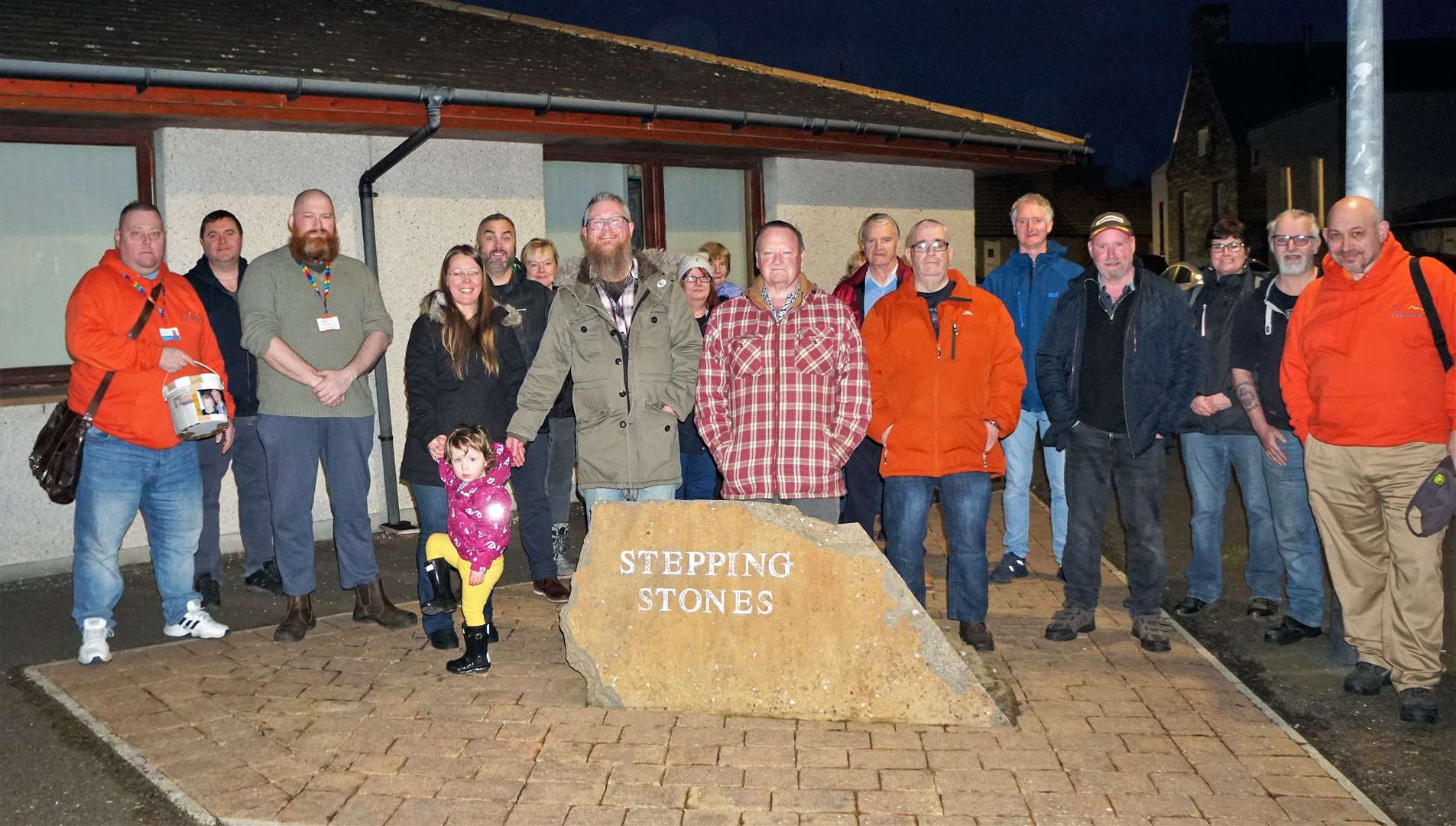 Ryan Buttress with Murdo McConell, at centre, with some of their supporters outside Stepping Stones in Thurso. Picture: DGS