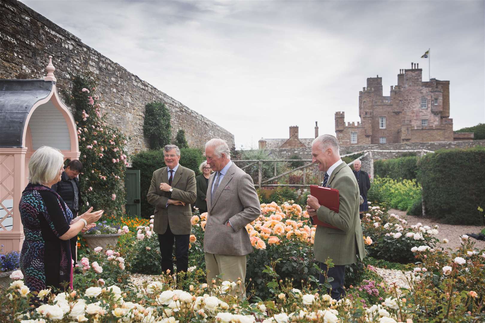 The Duke of Rothesay chatting to Christine Stone, of Castletown and Community Covid-19 Support and Response Volunteers, in the Castle of Mey gardens this morning. Picture: Colin Campbell