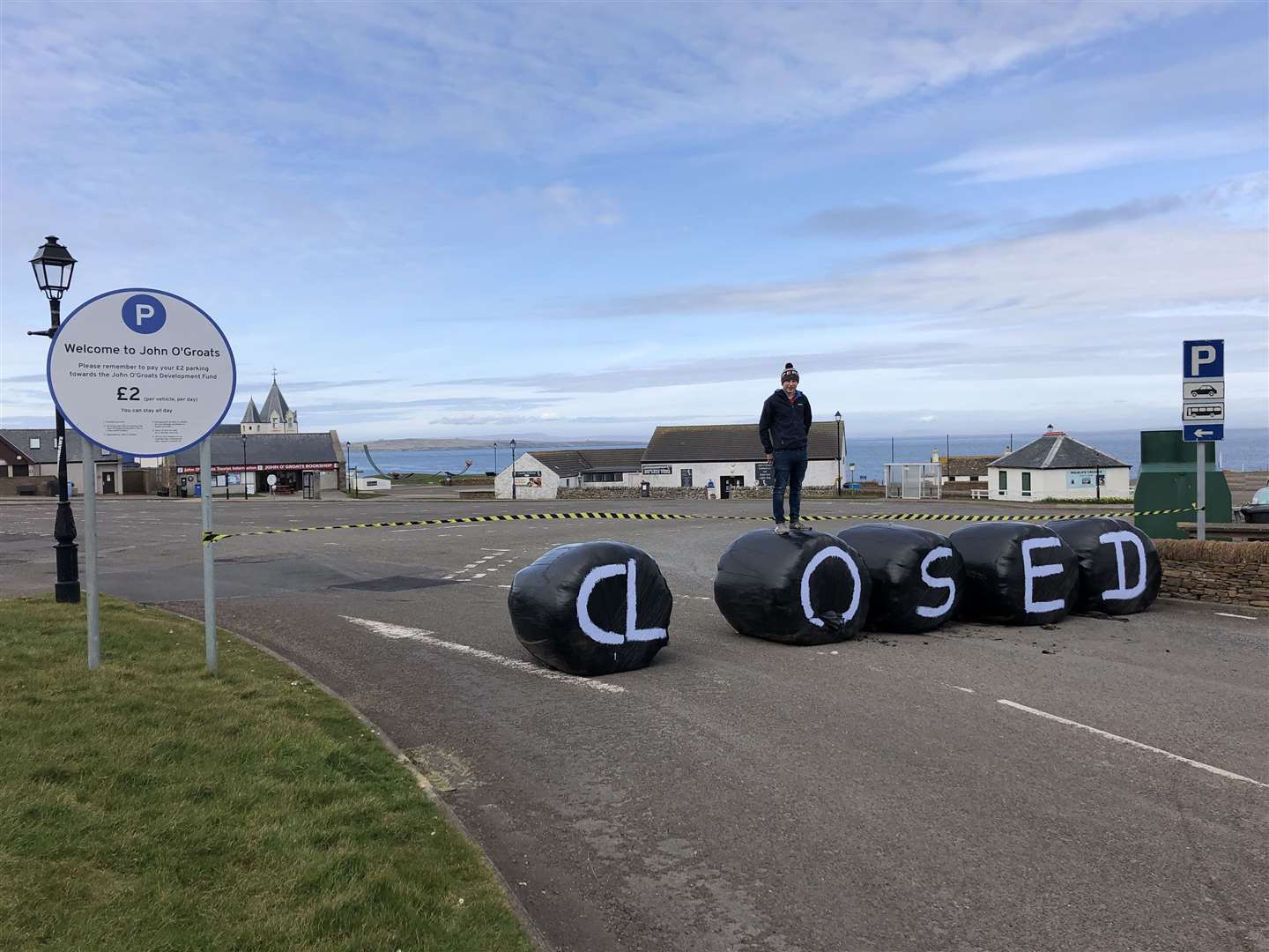 Closed for the time being: Michael Mowat on the bales at the John O'Groats car park.
