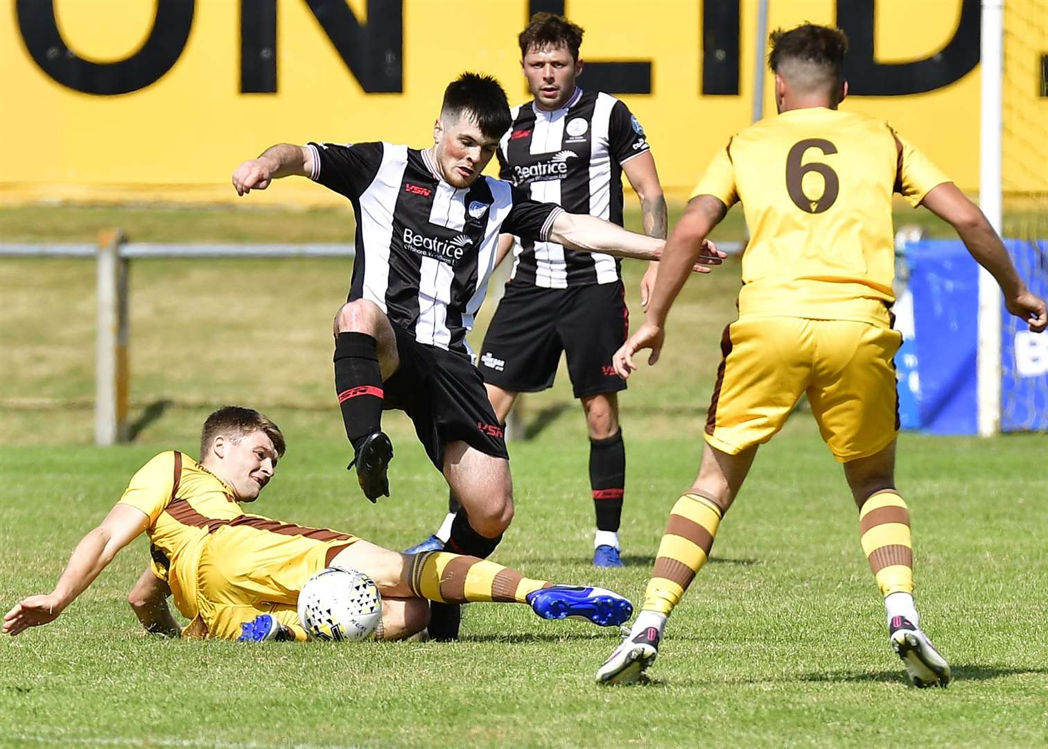 Wick Academy's Sean Campbell hurdles a challenge from Jack Grant of Forres Mechanics during last Saturday's 1-1 draw at Mosset Park. Picture: Mel Roger