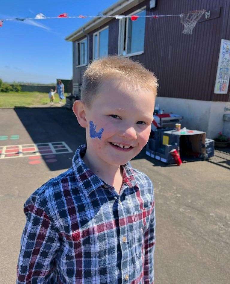 Kian was happy with this face-painting design.
