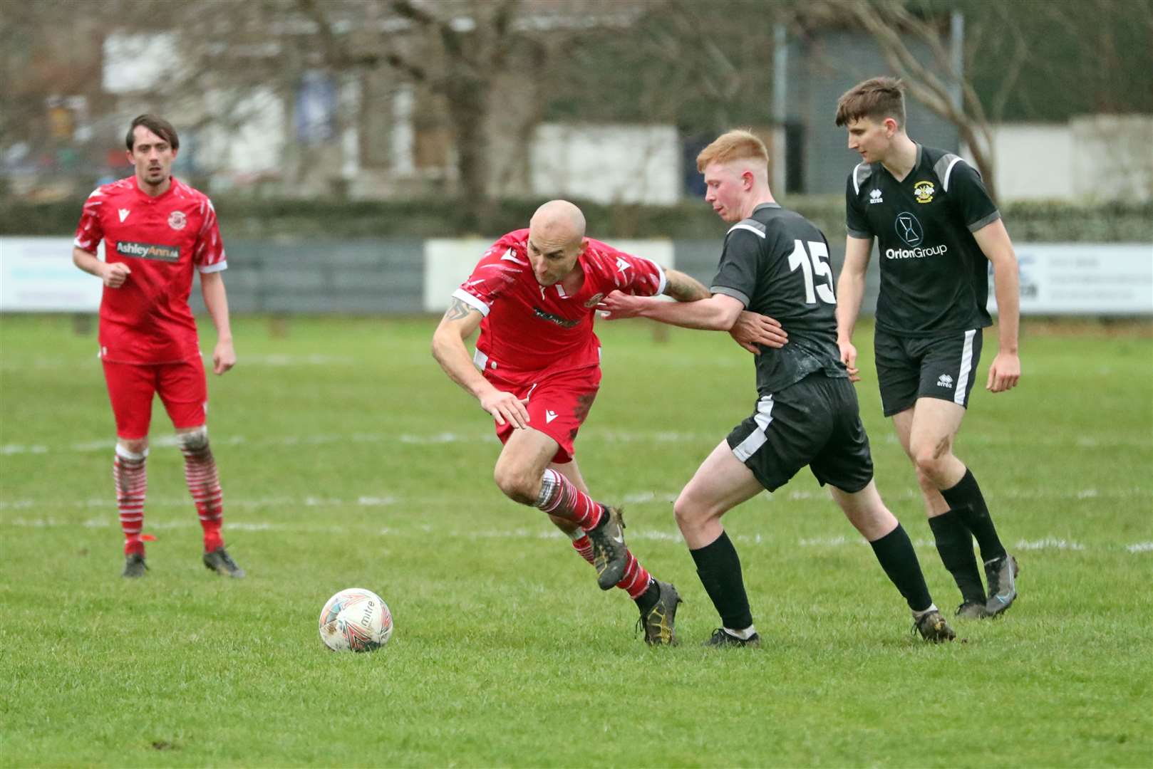 Thurso's Darren Sheppard is hauled back by Ross Gordon during the 3-3 draw with Clachnacuddin 'A' at the Dammies in November. Picture: James Gunn