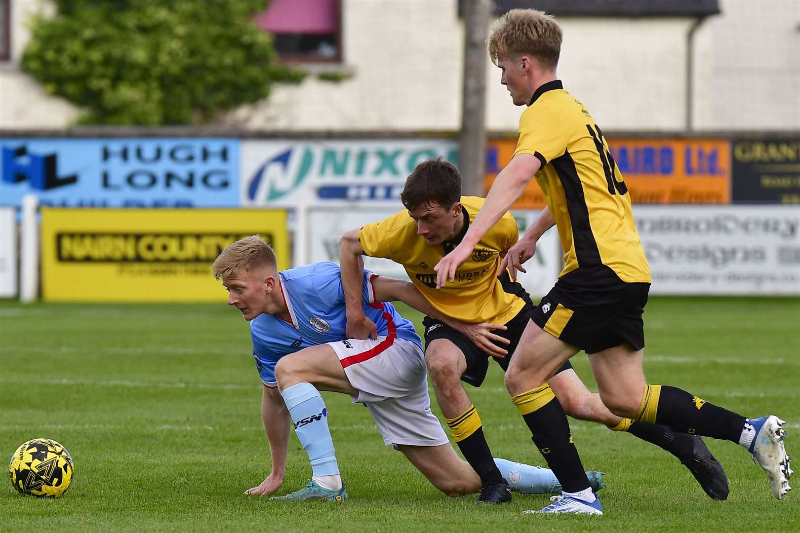Ross Gunn battles for possession with Nairn County's Kenny McKenzie. Picture: Mel Roger