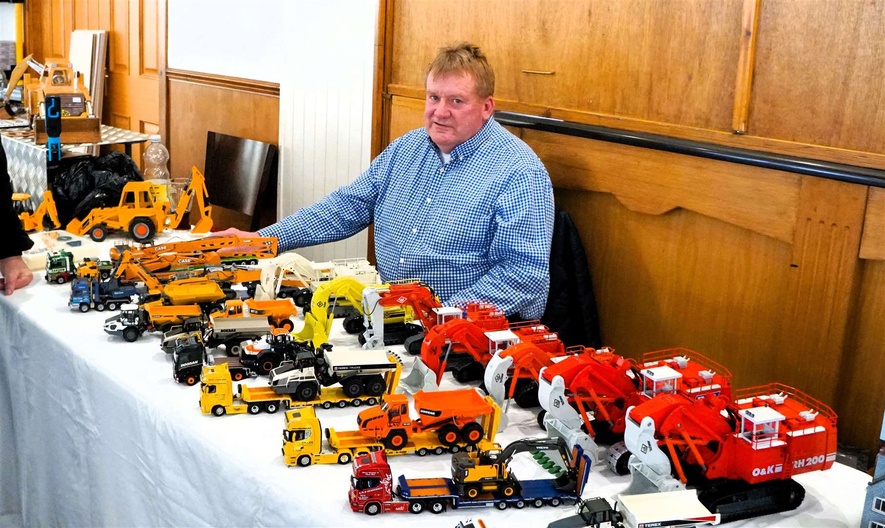 Alan Gow with some of his extensive collection of construction vehicles. Picture: DGS