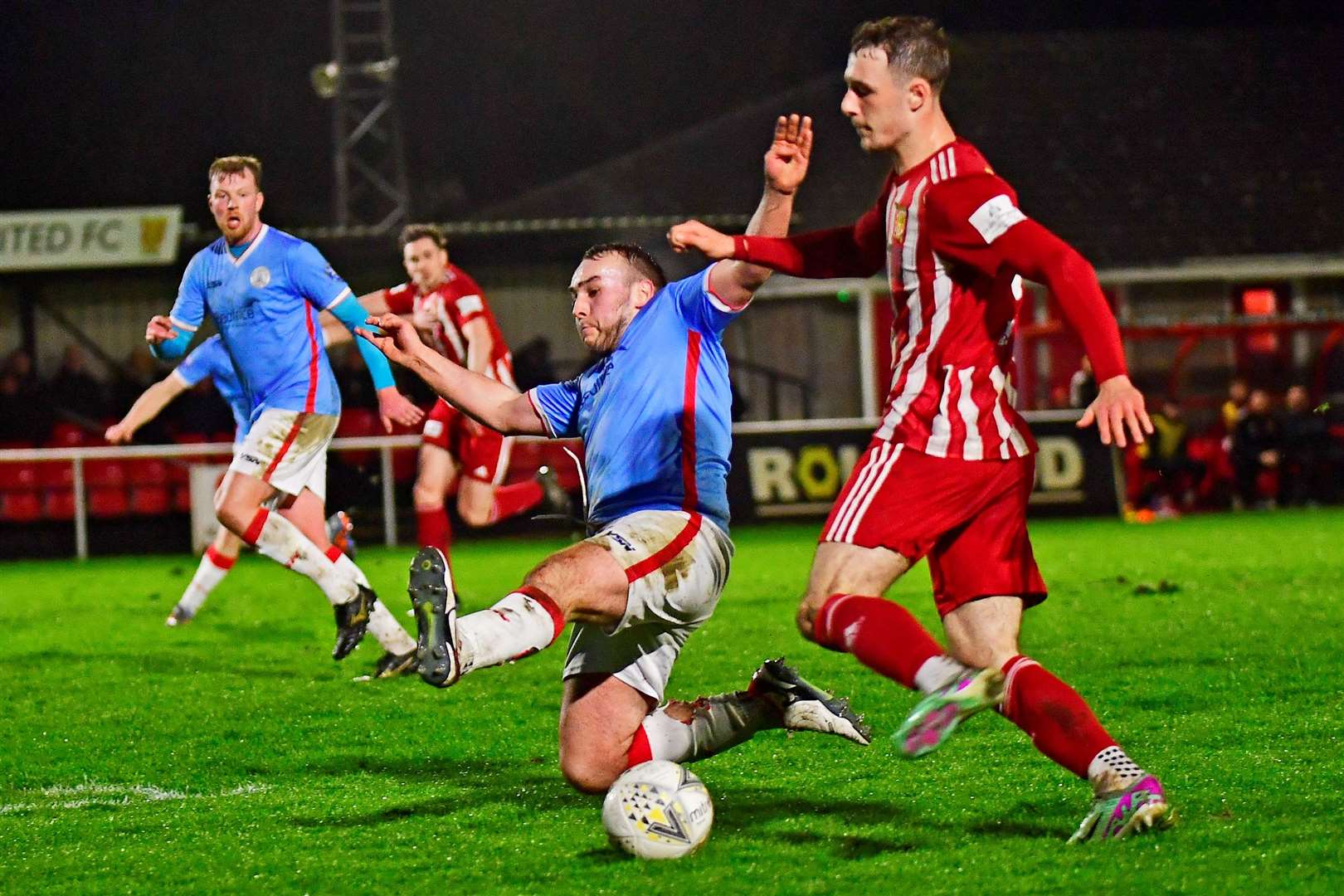 Wick Academy defender Owen Harrold blocks a cross from Formartine United's Aaron Reid during Wednesday night's Highland League match in Pitmedden. Picture: Mel Roger