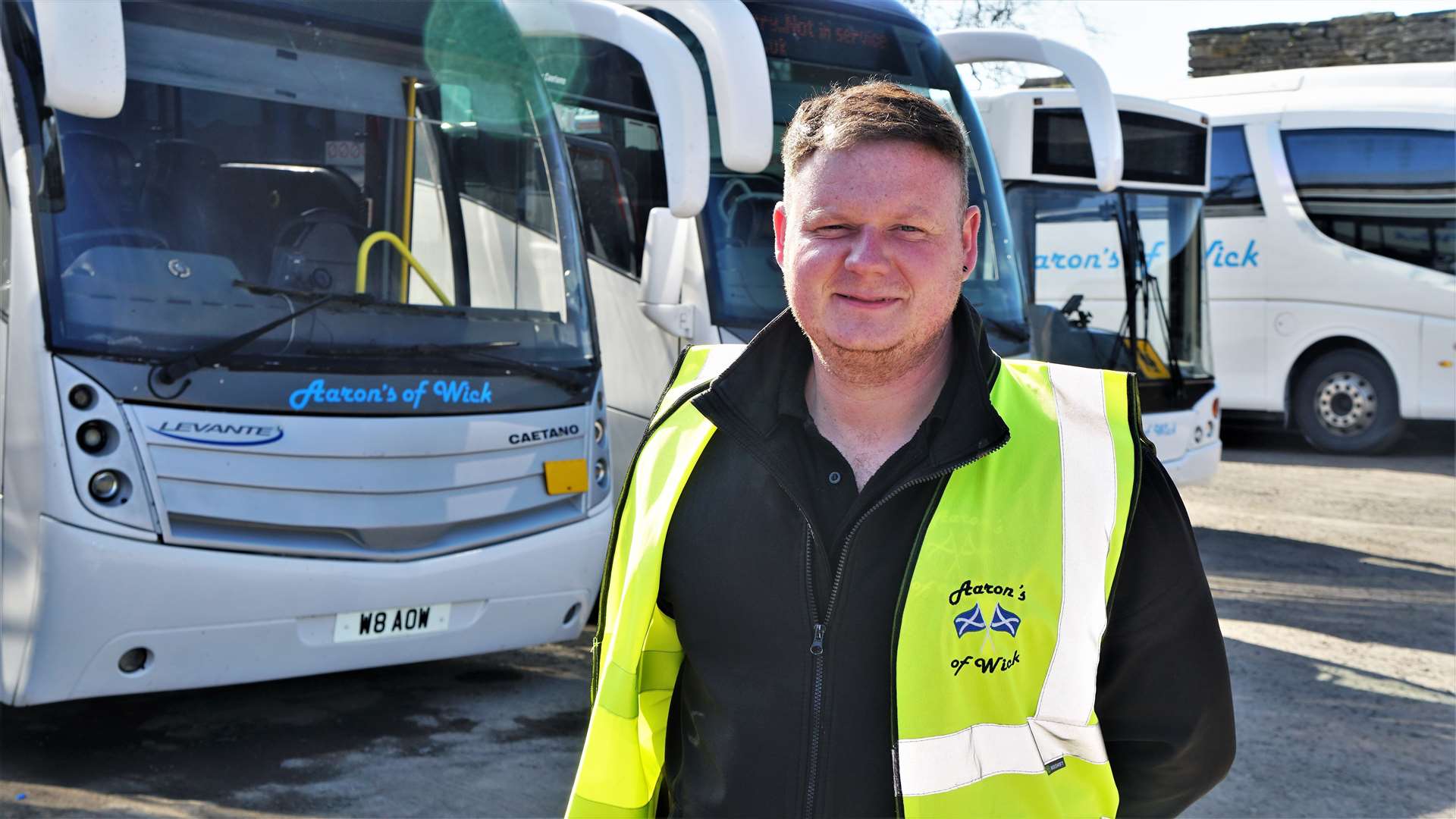 Aaron Wilson at his bus depot in Wick. He feels he has to take a stance with the council over the state of some rural roads in Caithness. Picture: DGS