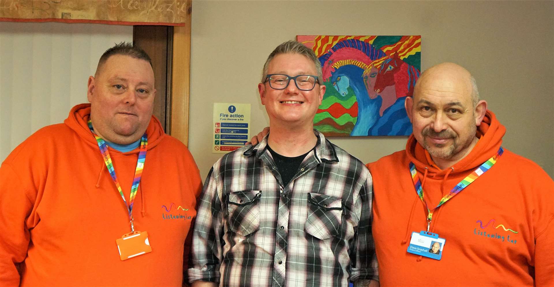 Baby-faced Ryan shows a more youthful side after being shaved many agreed. From left, Mark Boulton (project officer at Listening Ear Caithness), beardless Ryan Buttress, and Davie Snashall (outreach development manager with Listening Ear Caithness). Picture: DGS