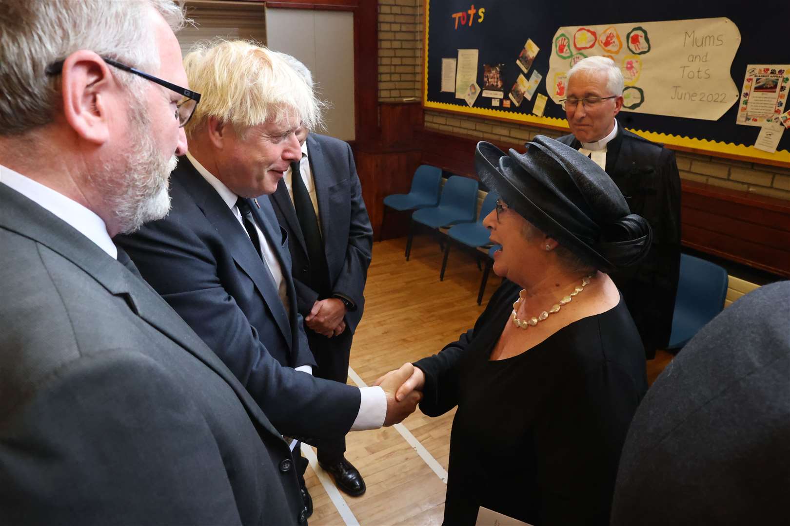 Prime Minister Boris Johnson greets Lady Daphne Trimble after the funeral of former Northern Ireland first minister and UUP leader David Trimble on Monday (Liam McBurney/PA)
