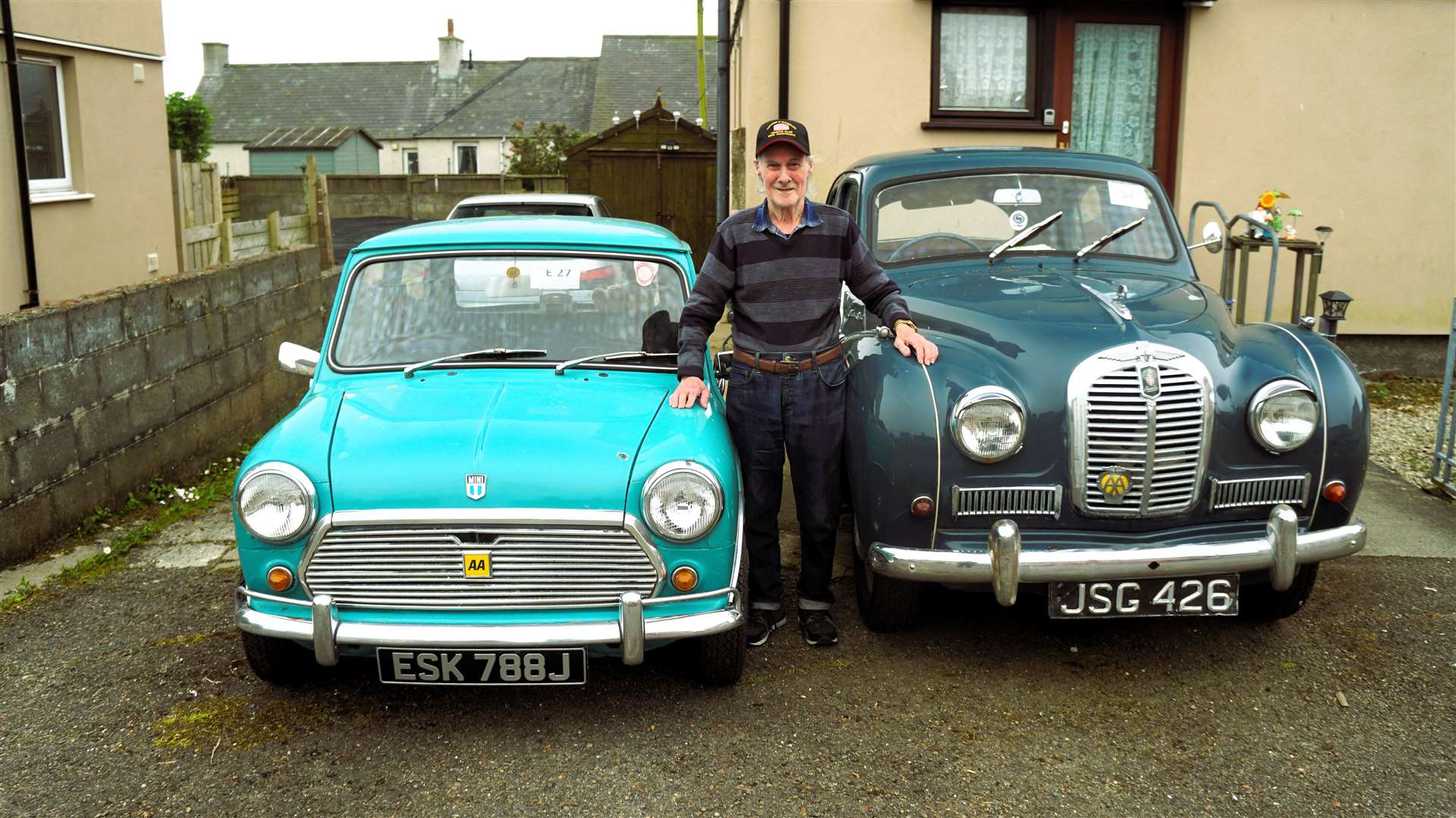 Ian Fraser with his vintage cars that he shows at vehicle rallies. Picture: DGS