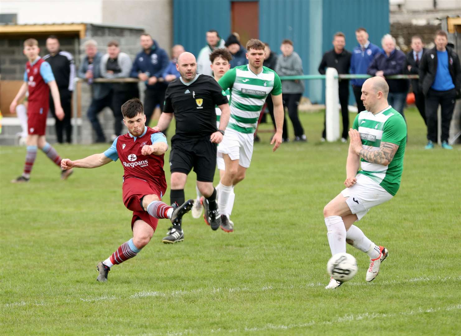 Sean Campbell of Pentland United shoots past Castletown's Danny Mackay. Picture: James Gunn