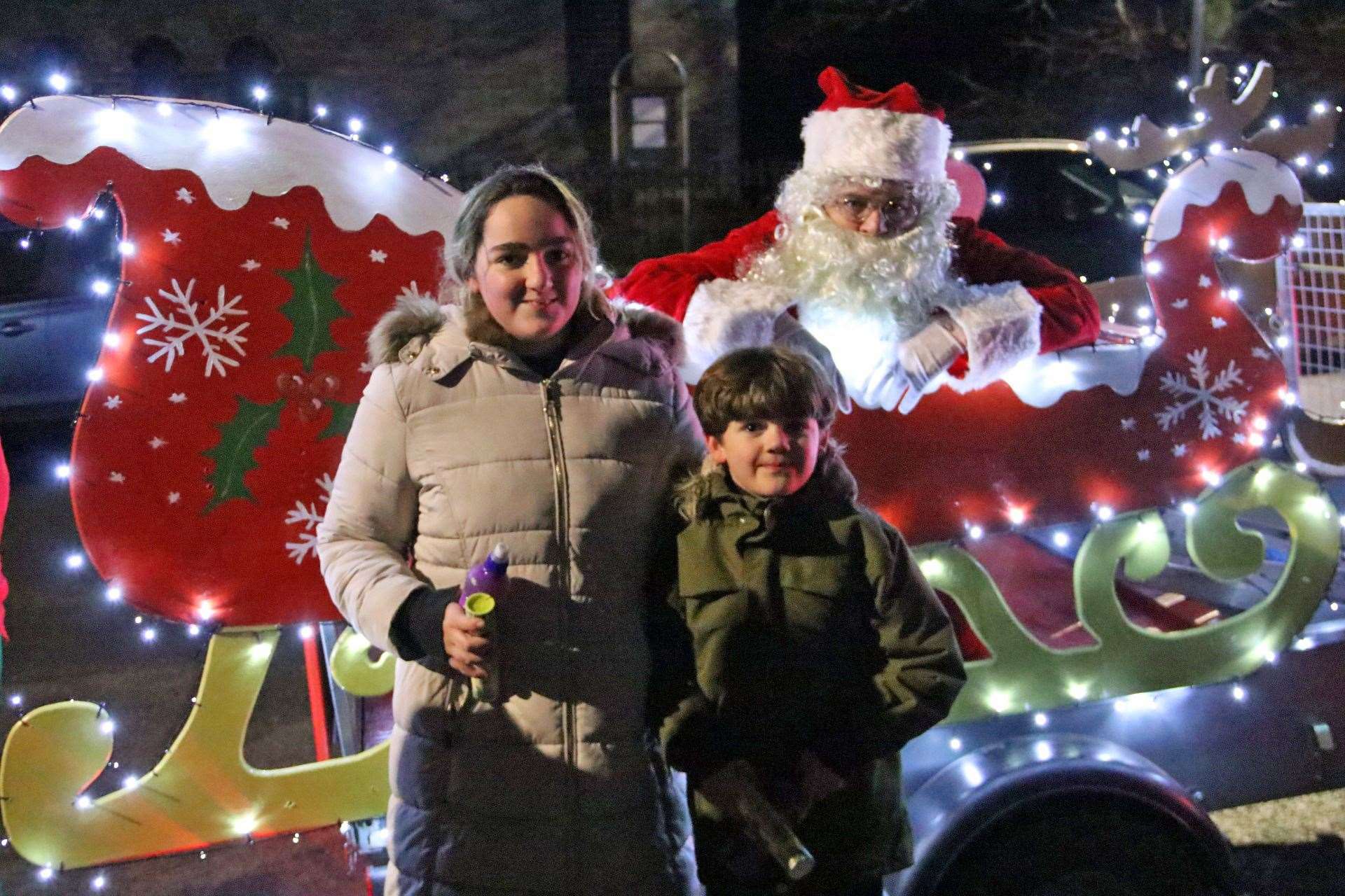 Grace and Adam Nicholls from Halkirk after receiving sweets from Santa. Picture: Ruthie Nicholls